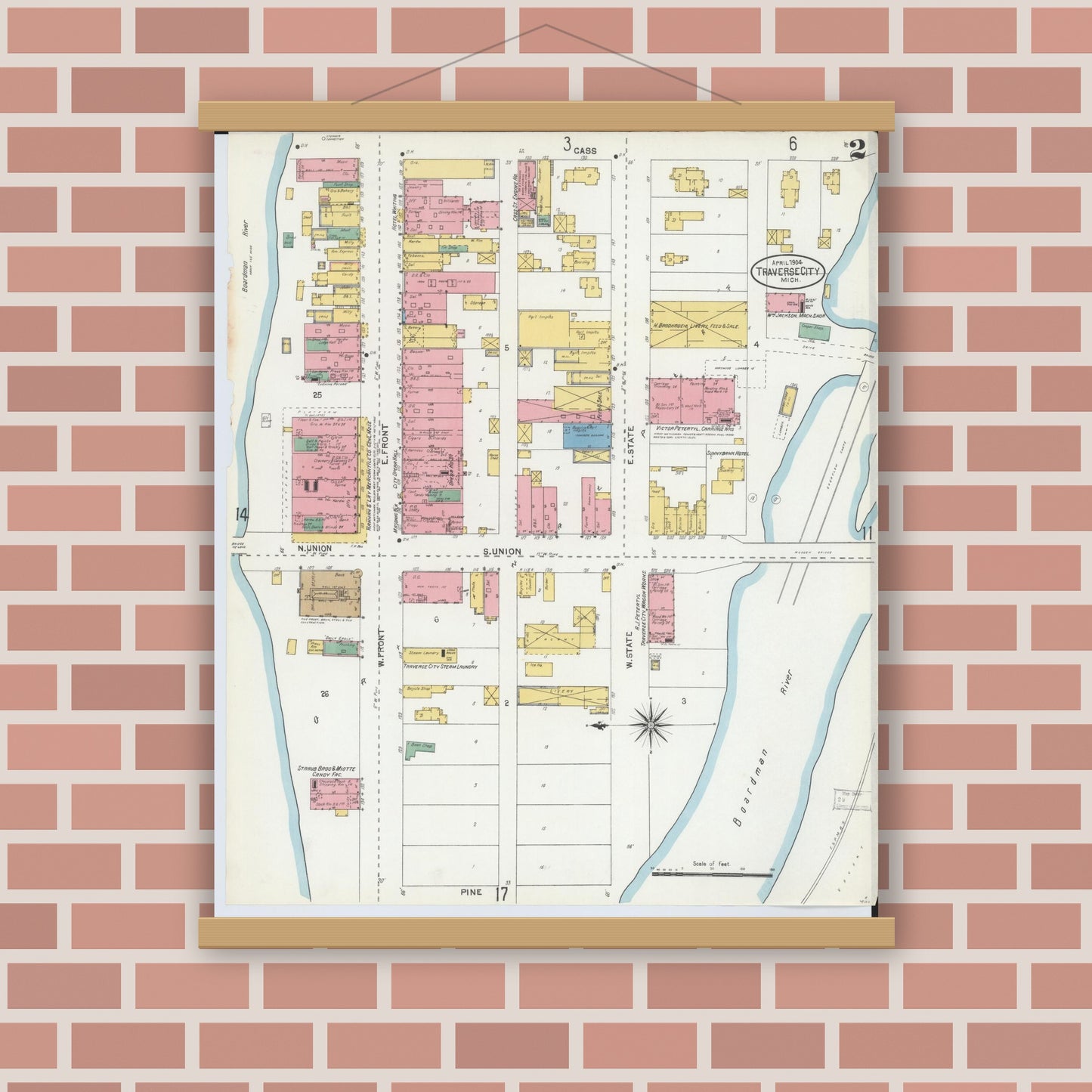 Old map wall art mockup — magnetic wood frame on brick wall — Sanborn Fire Insurance Map from Traverse City, Grand Traverse County, Michigan (1904), Sheet #0002