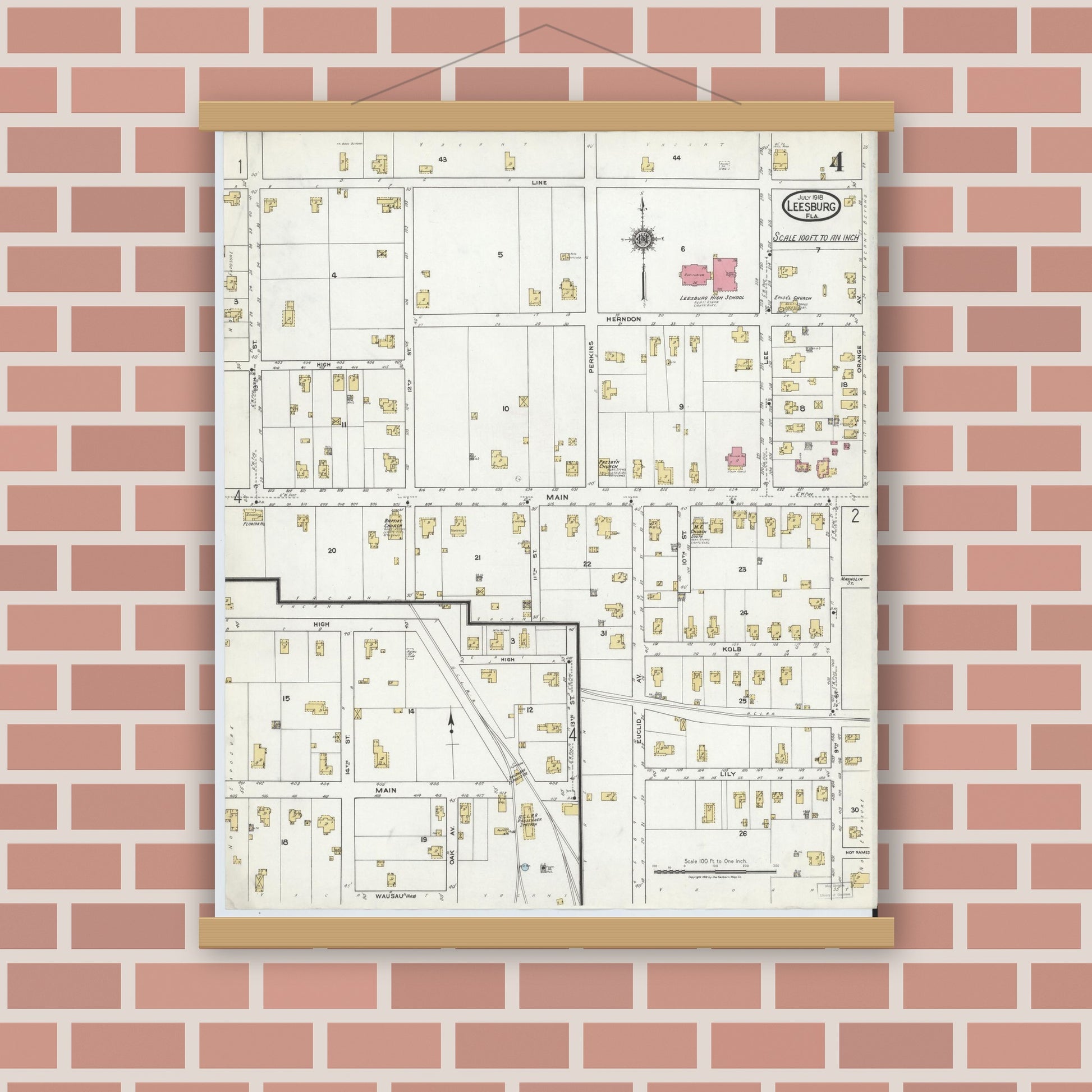 Old map wall art mockup — magnetic wood frame on brick wall — Sanborn Fire Insurance Map from Leesburg, Lake County, Florida (1918), Sheet #0004