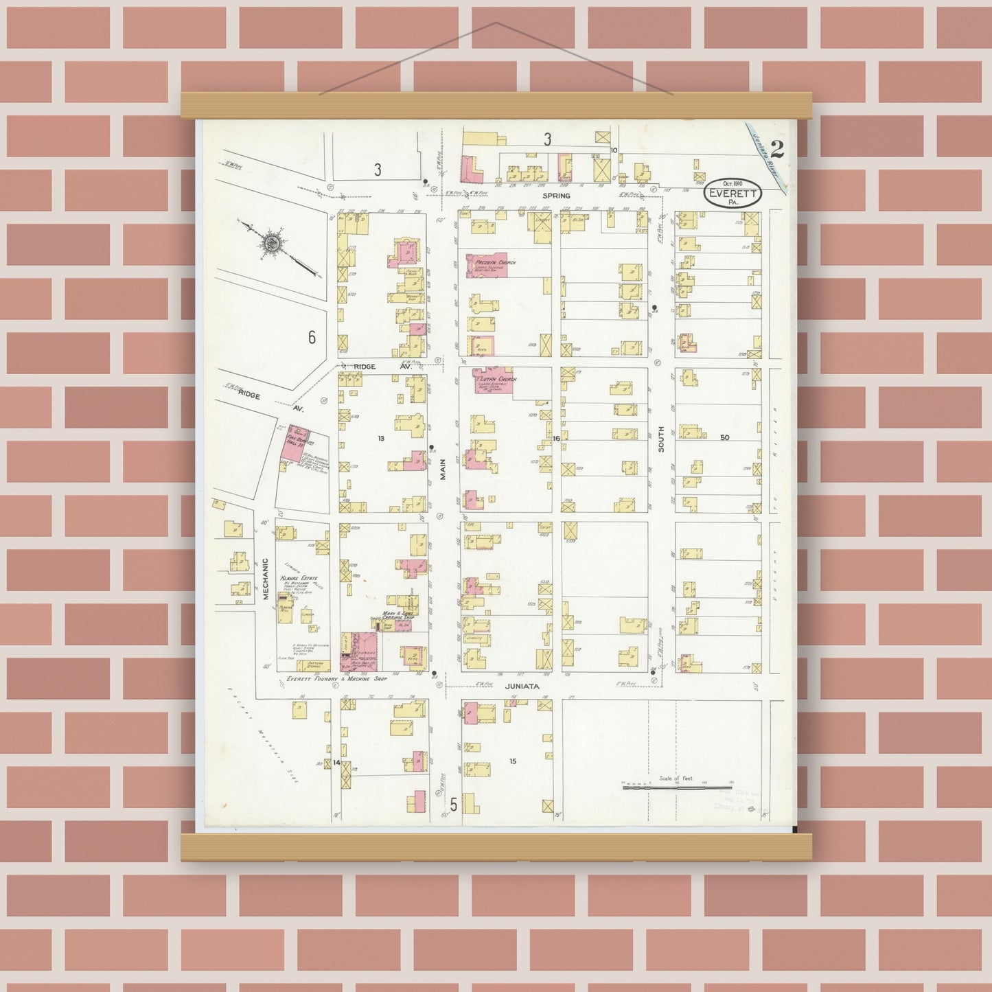 Old map wall art mockup — magnetic wood frame on brick wall — Sanborn Fire Insurance Map from Everett, Bedford County, Pennsylvania (1910), Sheet #0002