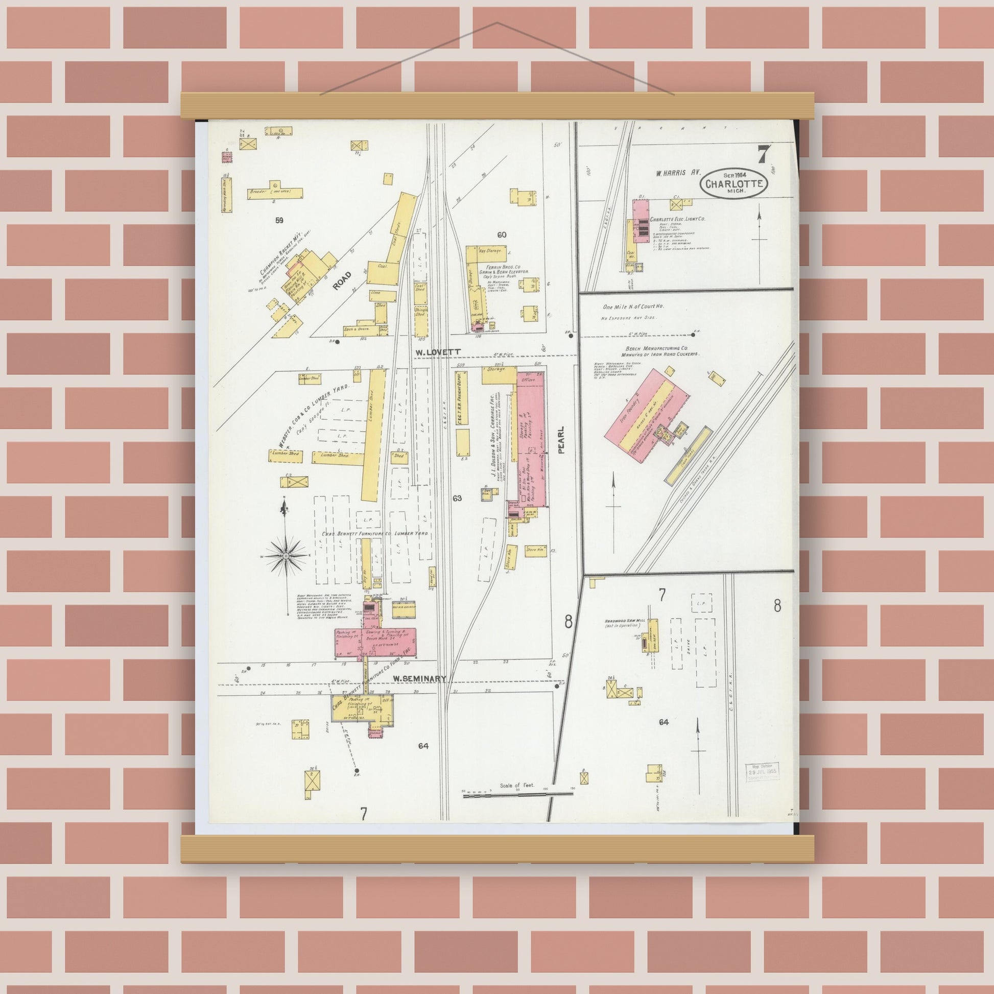 Old map wall art mockup — magnetic wood frame on brick wall — Sanborn Fire Insurance Map from Charlotte, Eaton County, Michigan (1904), Sheet #0007
