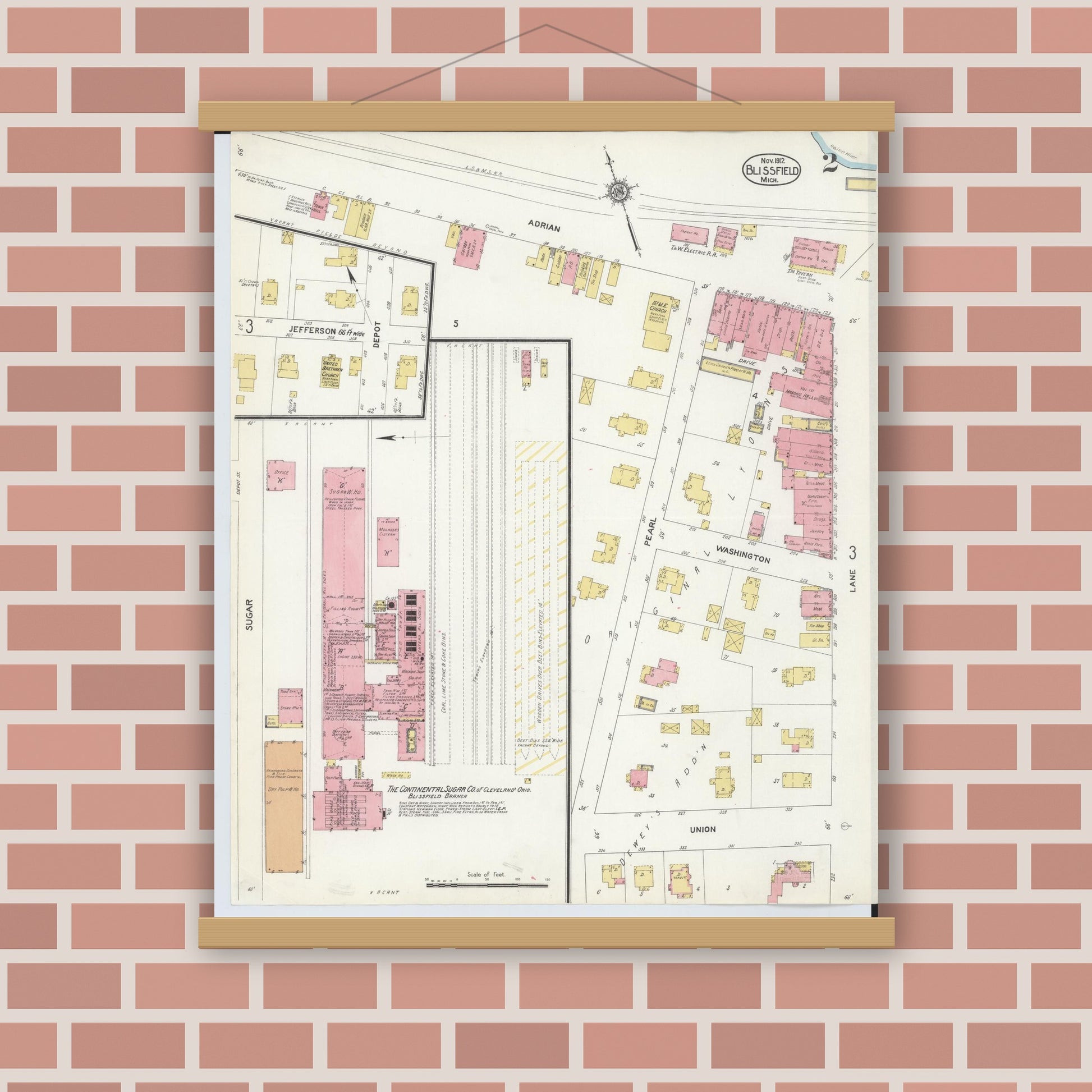 Old map wall art mockup — magnetic wood frame on brick wall — Sanborn Fire Insurance Map from Blissfield, Lenawee County, Michigan (1912), Sheet #0002