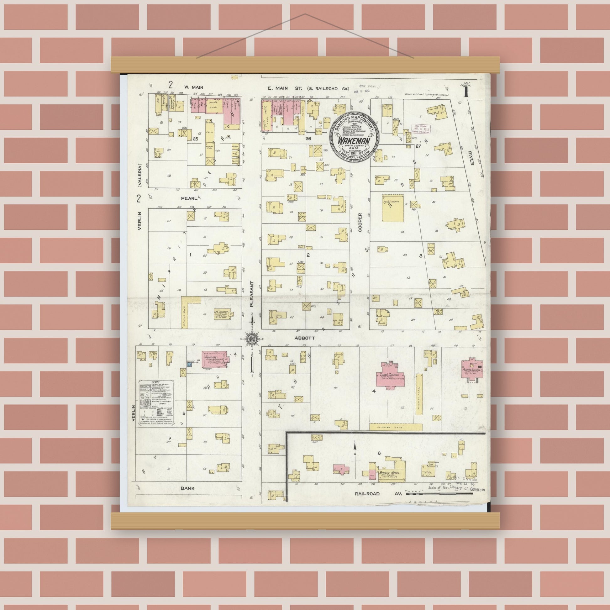 Old map wall art mockup — magnetic wood frame on brick wall — Sanborn Fire Insurance Map from Wakeman, Huron County, Ohio (1911), Sheet #0001