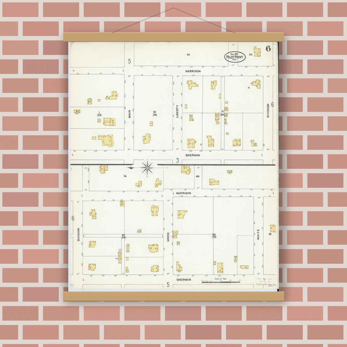 Old map wall art mockup — magnetic wood frame on brick wall — Sanborn Fire Insurance Map from Pilot Point, Denton County, Texas (1907), Sheet #0006