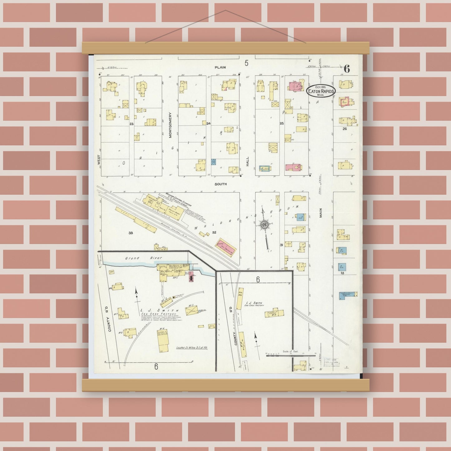 Old map wall art mockup — magnetic wood frame on brick wall — Sanborn Fire Insurance Map from Eaton Rapids, Eaton County, Michigan (1911), Sheet #0006