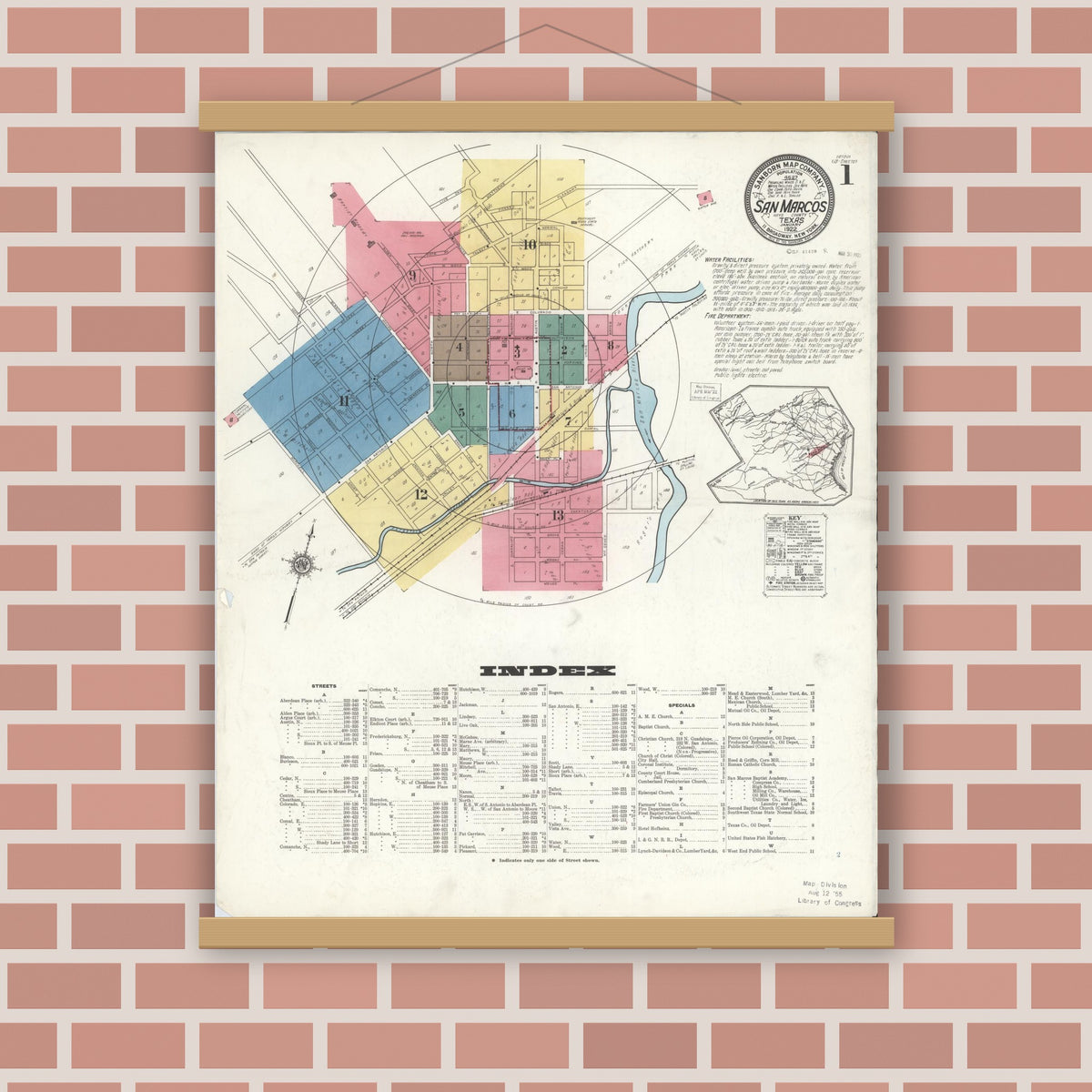 Old map wall art mockup — magnetic wood frame on brick wall — Sanborn Fire Insurance Map from San Marcos, Hays County, Texas (1922) - Complete Map Set
