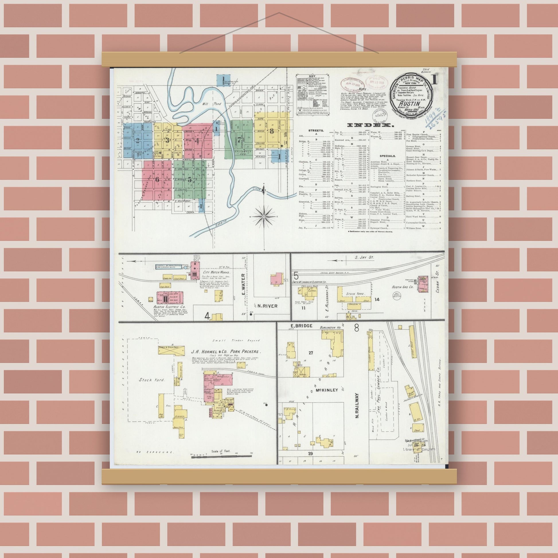 Old map wall art mockup — magnetic wood frame on brick wall — Sanborn Fire Insurance Map from Austin, Mower County, Minnesota (1899), Sheet #0001