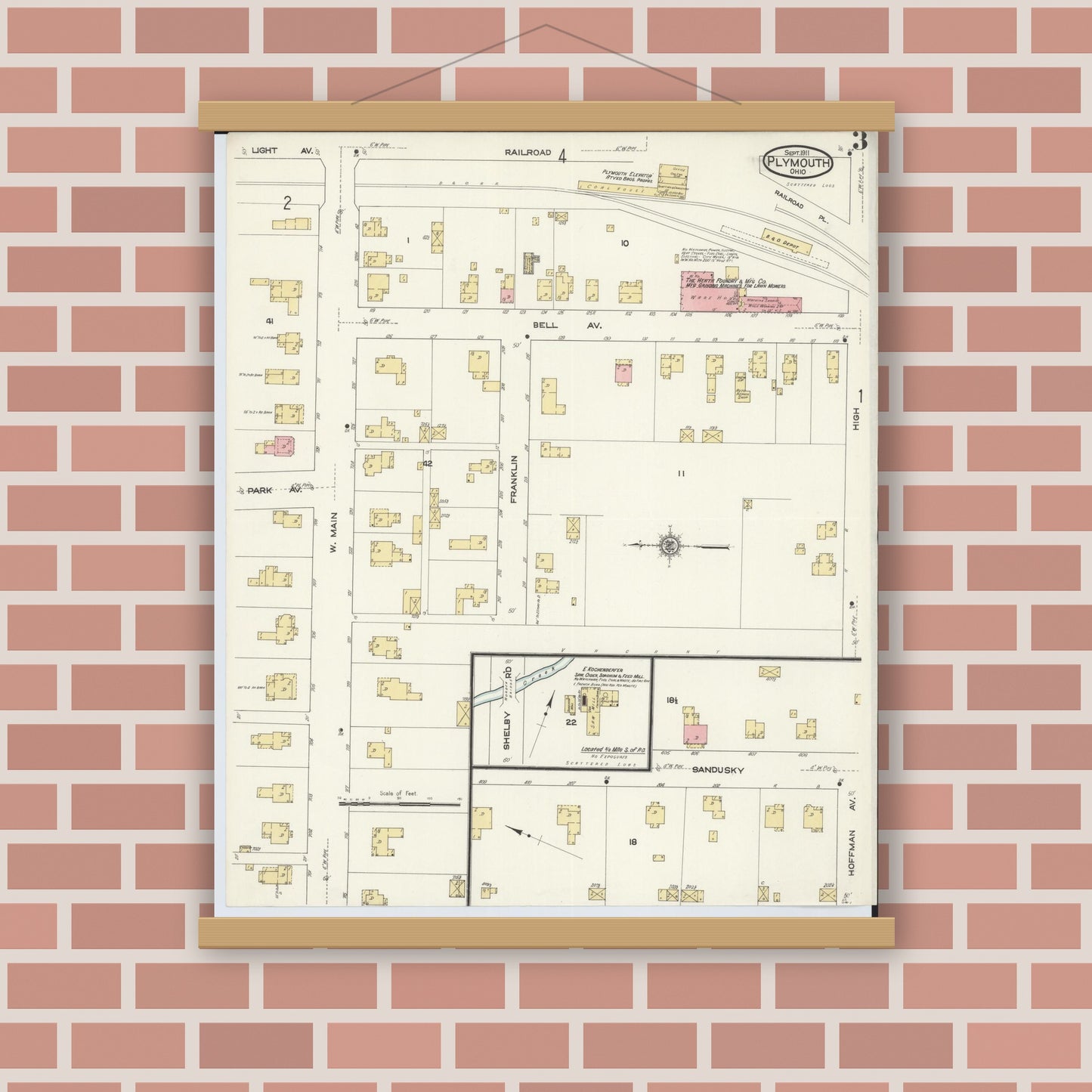 Old map wall art mockup — magnetic wood frame on brick wall — Sanborn Fire Insurance Map from Plymouth, Huron And Richland Counties, Ohio (1911), Sheet #0003