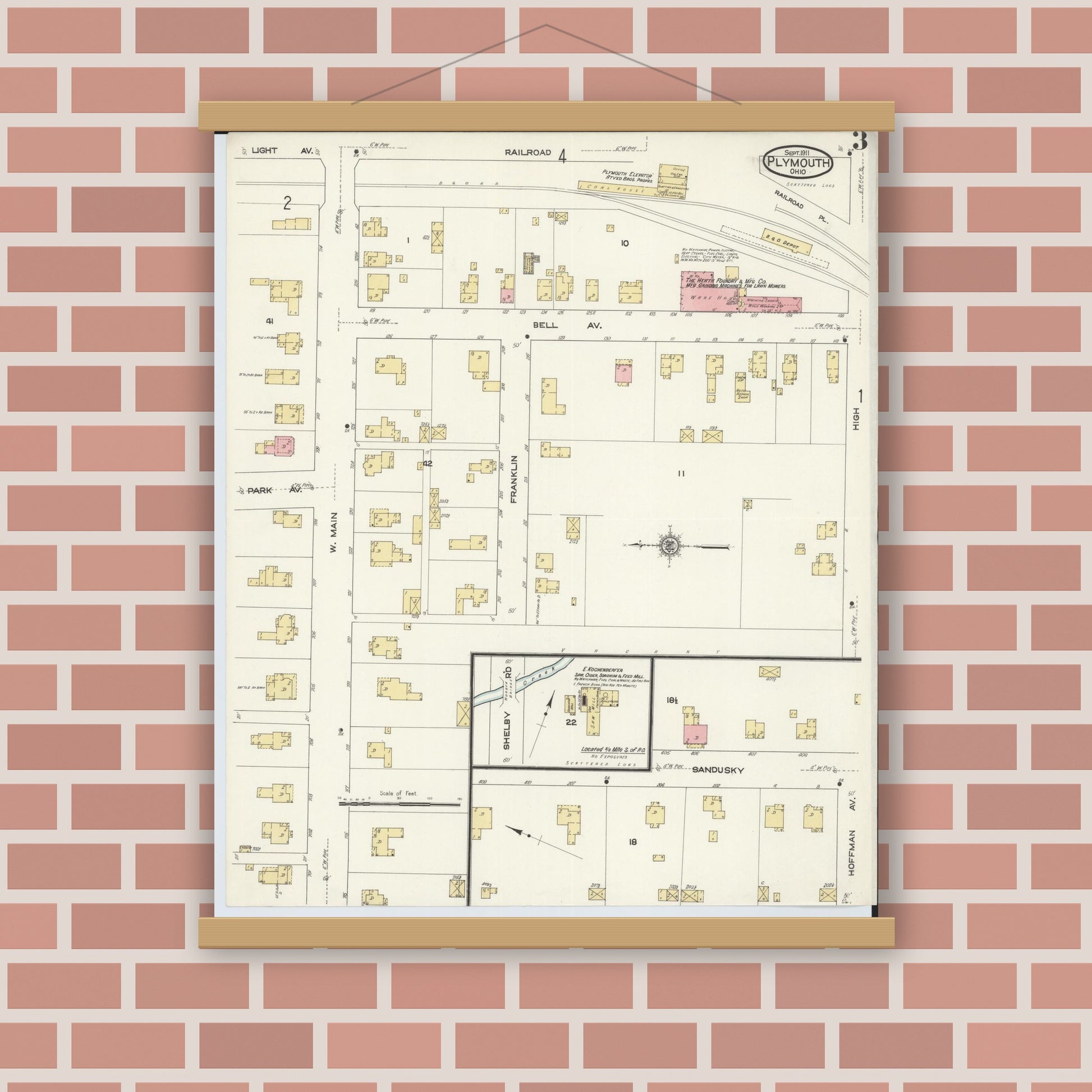 Old map wall art mockup — magnetic wood frame on brick wall — Sanborn Fire Insurance Map from Plymouth, Huron And Richland Counties, Ohio (1911), Sheet #0003
