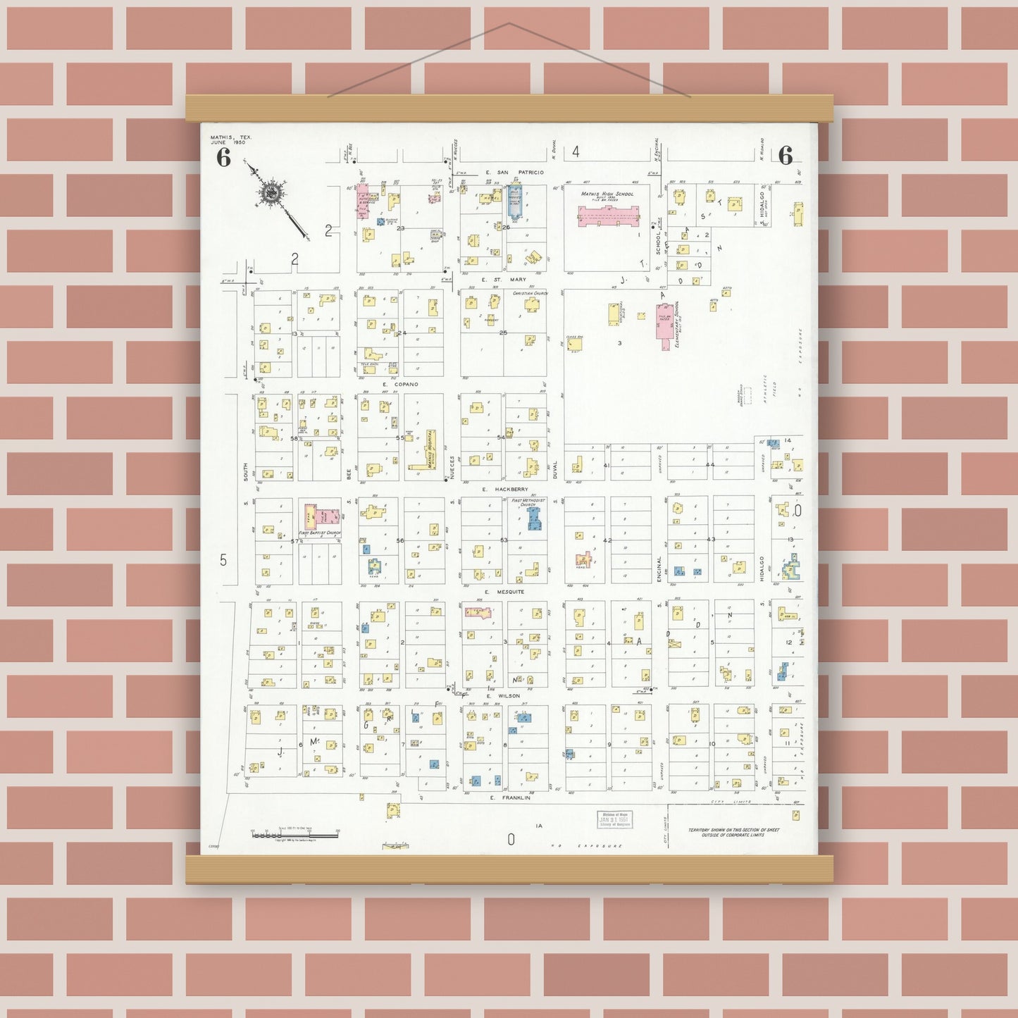 Old map wall art mockup — magnetic wood frame on brick wall — Sanborn Fire Insurance Map from Mathis, San Patricio County, Texas (1950), Sheet #0006