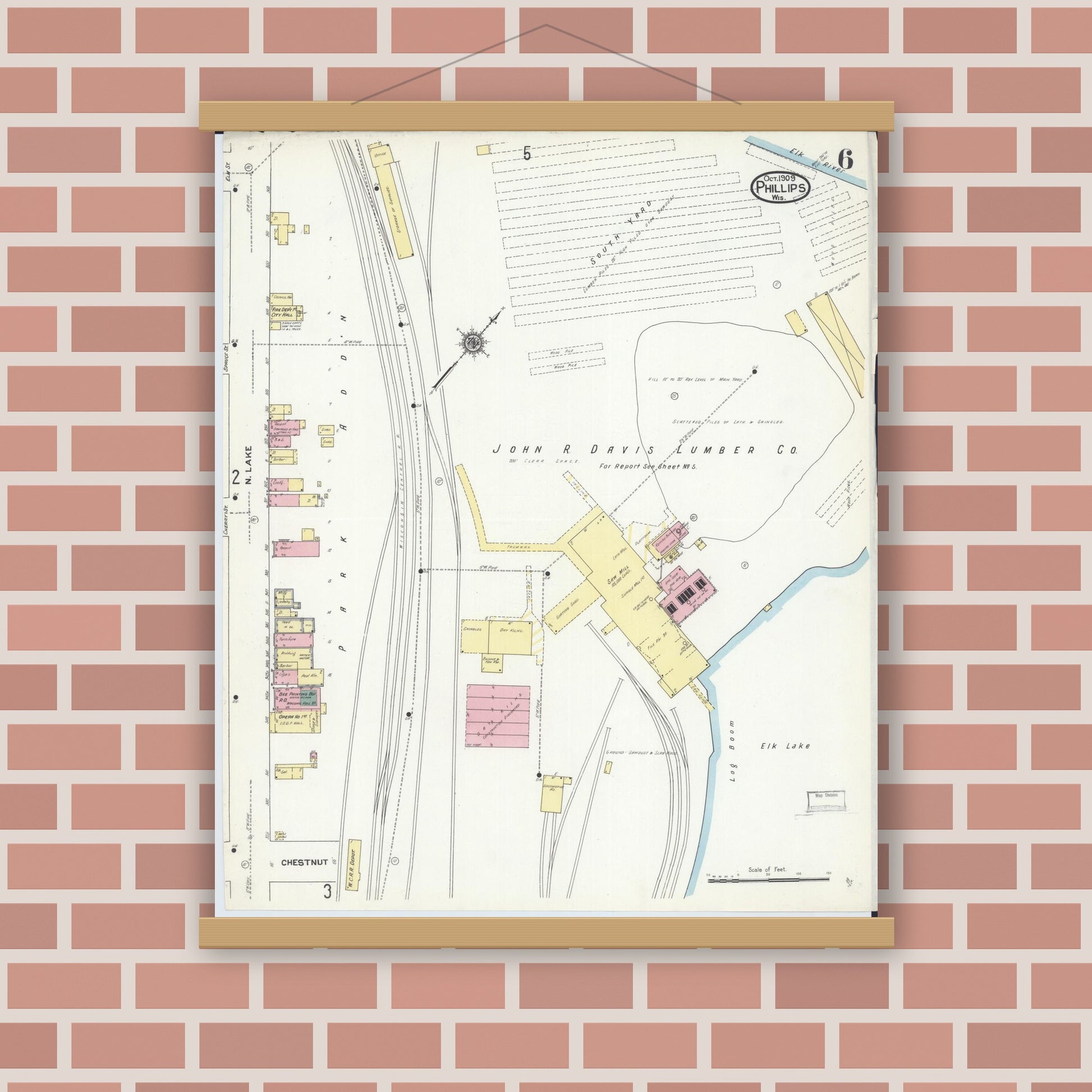 Old map wall art mockup — magnetic wood frame on brick wall — Sanborn Fire Insurance Map from Phillips, Price County, Wisconsin (1909), Sheet #0006