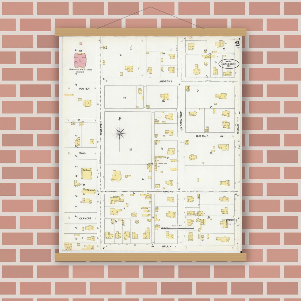 Old map wall art mockup — magnetic wood frame on brick wall — Sanborn Fire Insurance Map from Gainesville, Cooke County, Texas (1902), Sheet #0002