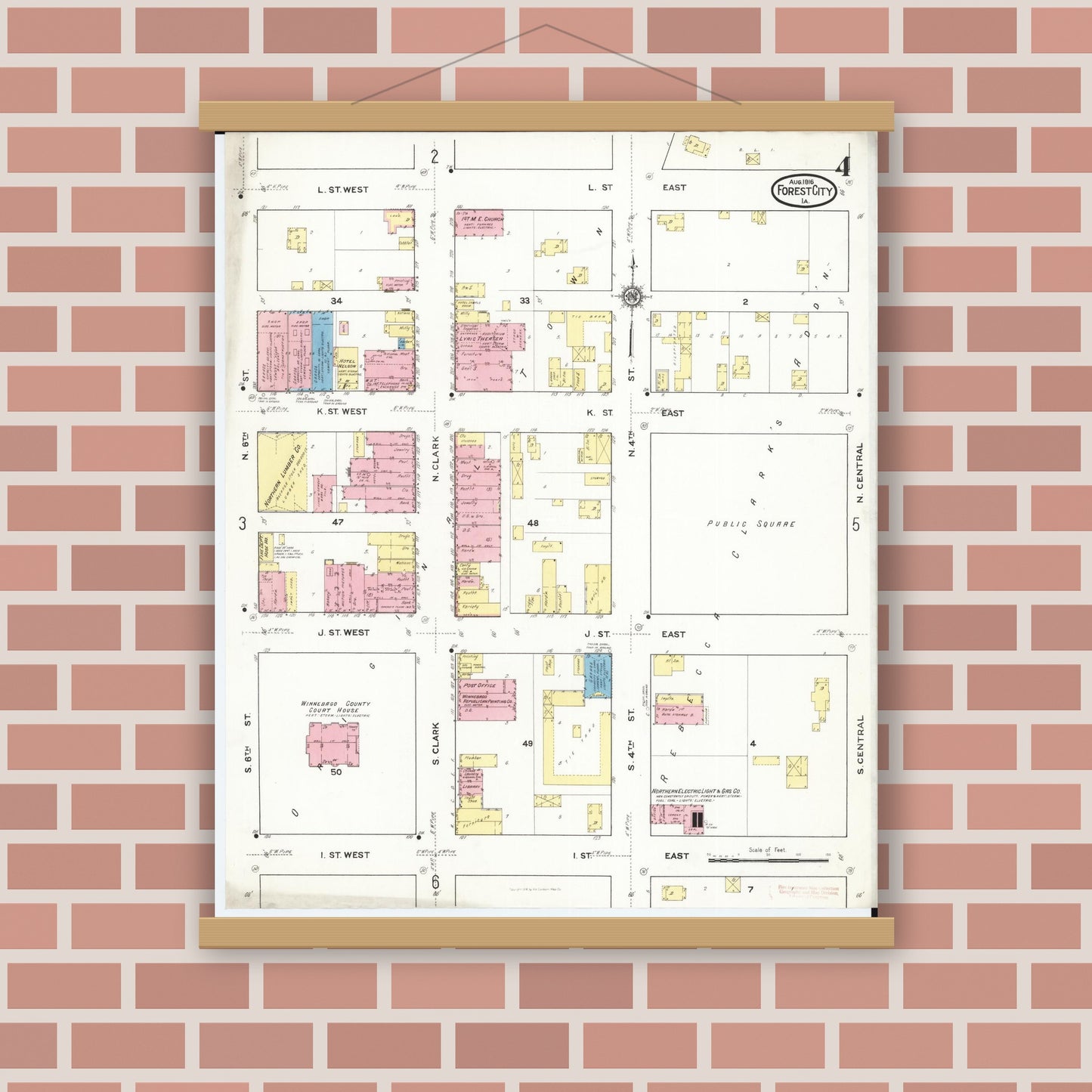 Old map wall art mockup — magnetic wood frame on brick wall — Sanborn Fire Insurance Map from Forest City, Winnebago County, Iowa (1916), Sheet #0004