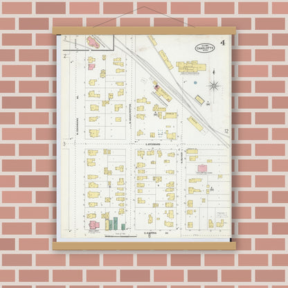 Old map wall art mockup — magnetic wood frame on brick wall — Sanborn Fire Insurance Map from Charlotte, Eaton County, Michigan (1904), Sheet #0004