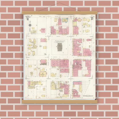 Old map wall art mockup — magnetic wood frame on brick wall — Sanborn Fire Insurance Map from Conroe, Montgomery County, Texas (1943), Sheet #0002
