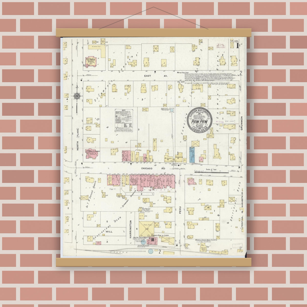 Old map wall art mockup — magnetic wood frame on brick wall — Sanborn Fire Insurance Map from Paw Paw, Lee County, Illinois (1910), Sheet #0001
