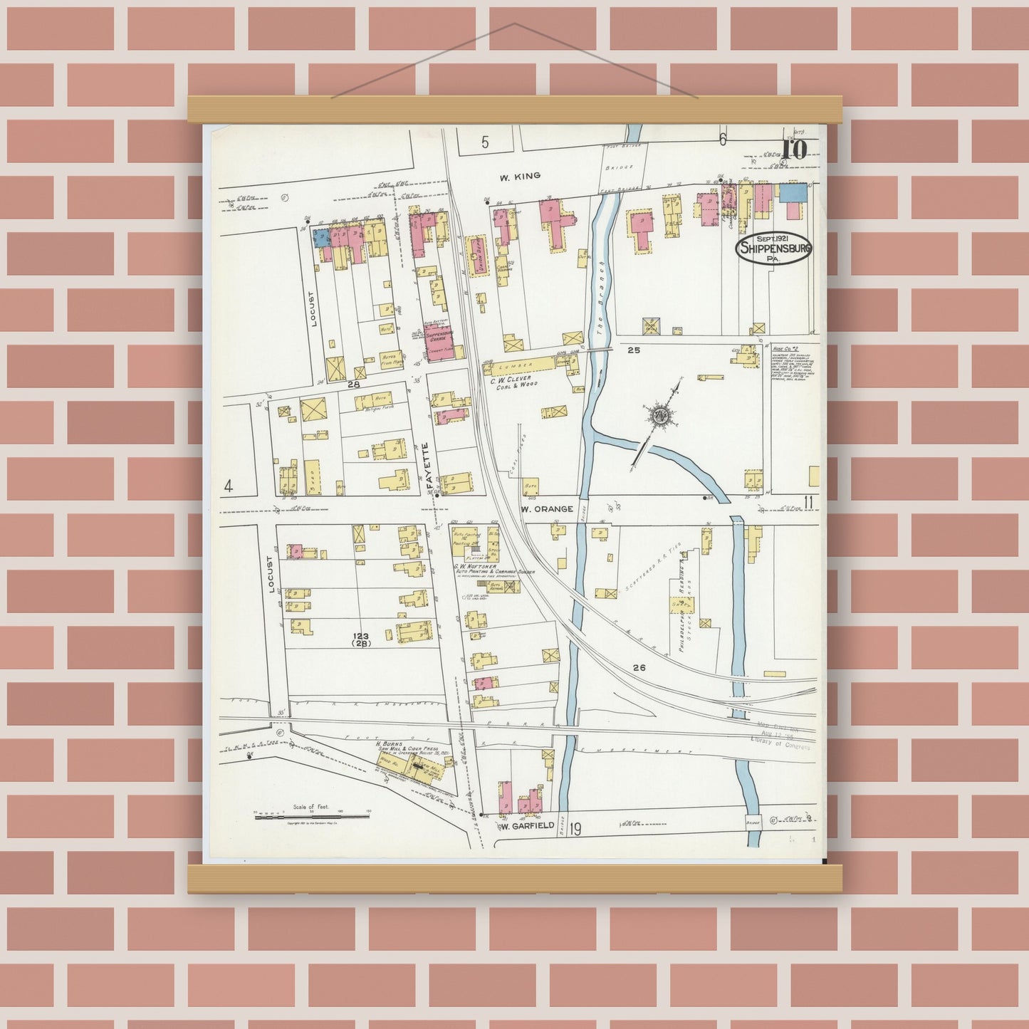 Old map wall art mockup — magnetic wood frame on brick wall — Sanborn Fire Insurance Map from Shippensburg, Cumberland And Franklin Counties, Pennsylvania (1921), Sheet #0010