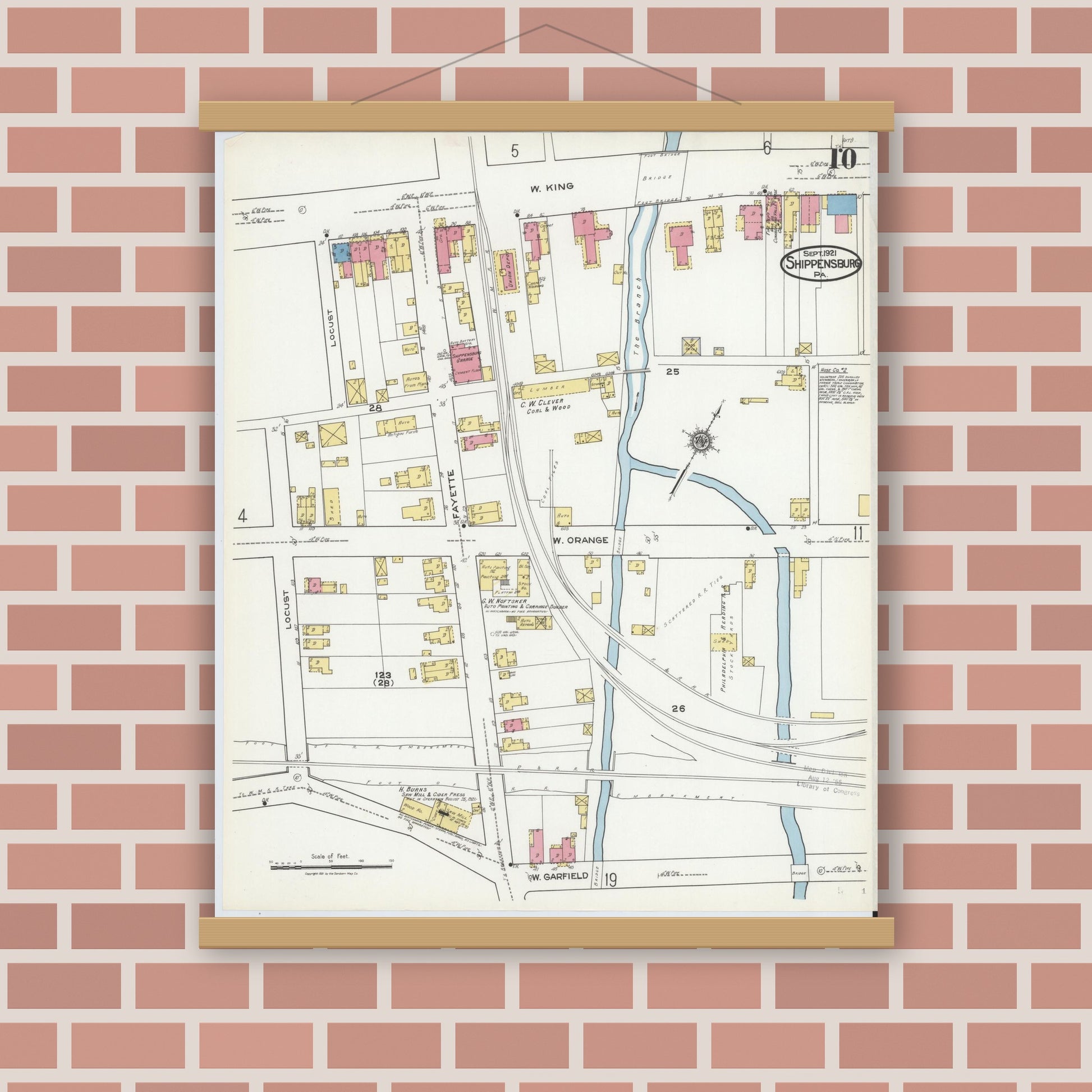 Old map wall art mockup — magnetic wood frame on brick wall — Sanborn Fire Insurance Map from Shippensburg, Cumberland And Franklin Counties, Pennsylvania (1921), Sheet #0010