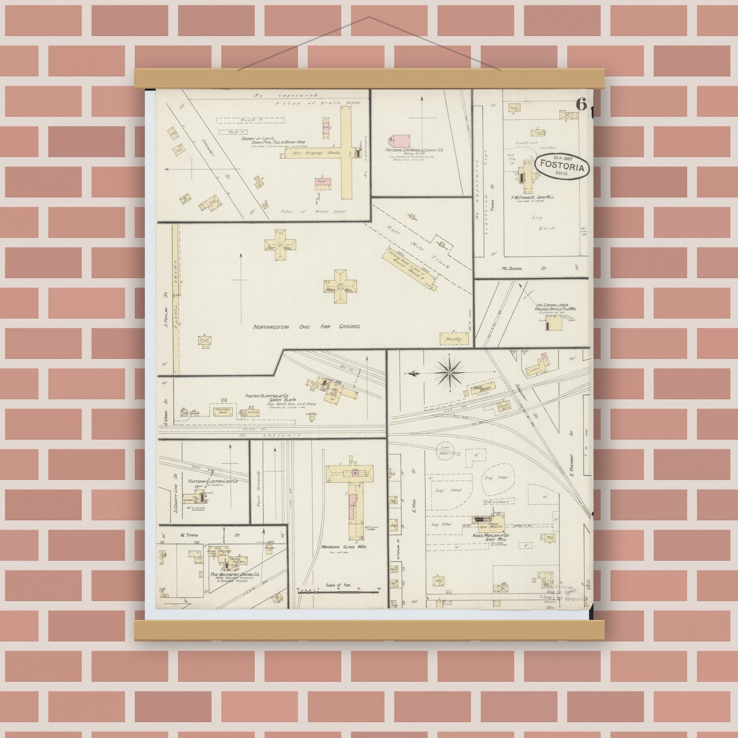 Old map wall art mockup — magnetic wood frame on brick wall — Sanborn Fire Insurance Map from Fostoria, Seneca, Hancock, And Wood Counties, Ohio (1887), Sheet #0006
