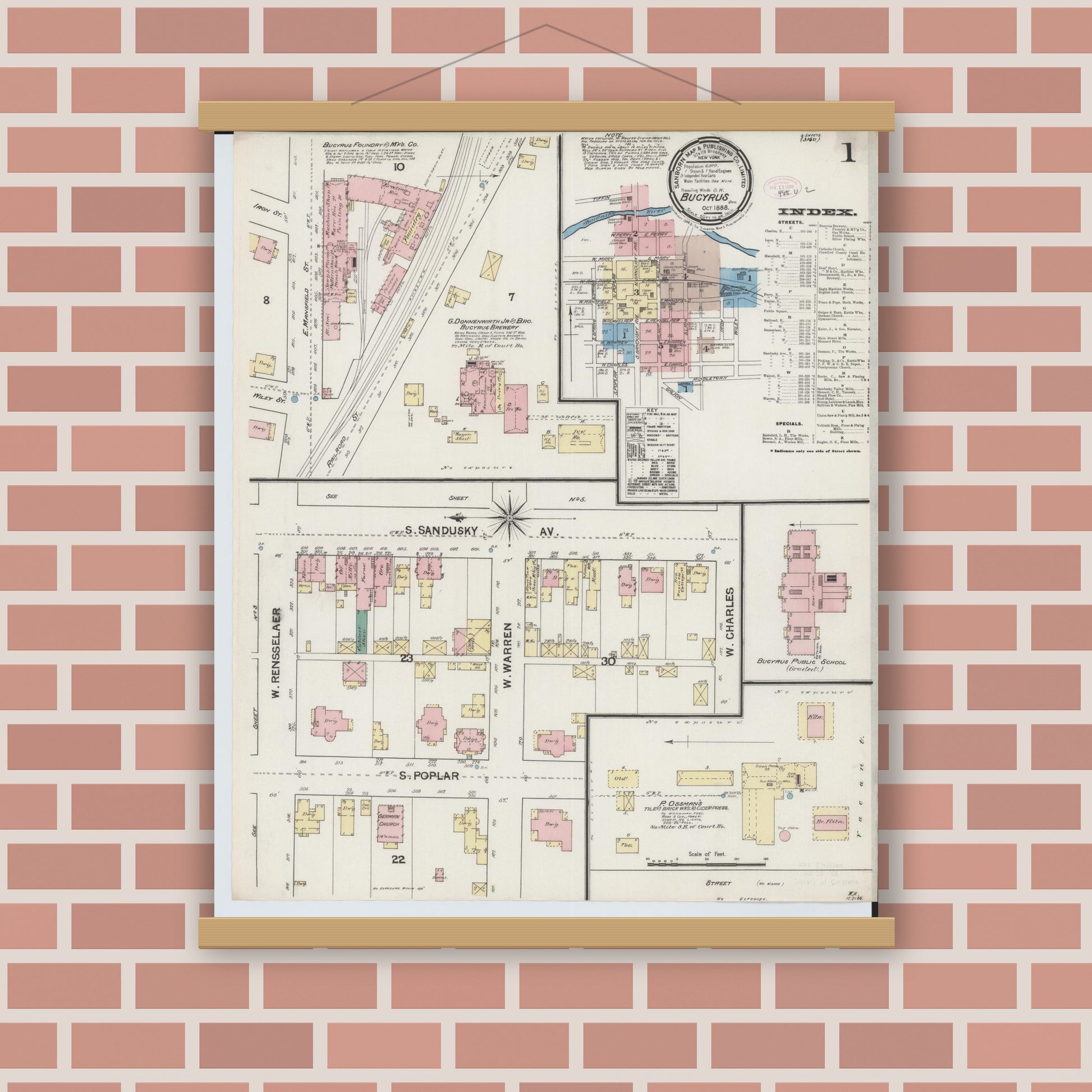 Old map wall art mockup — magnetic wood frame on brick wall — Sanborn Fire Insurance Map from Bucyrus, Crawford County, Ohio (1888), Sheet #0001