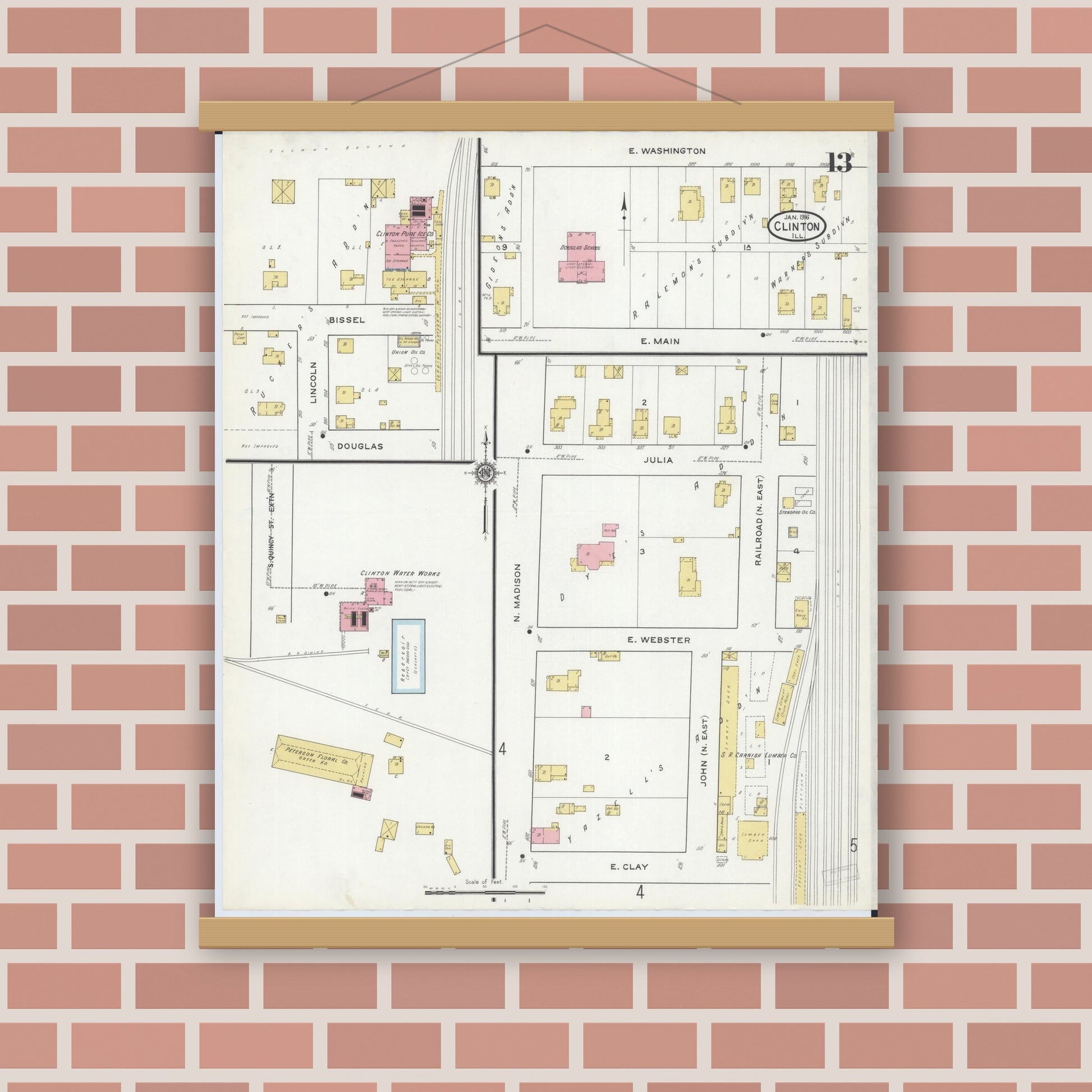 Old map wall art mockup — magnetic wood frame on brick wall — Sanborn Fire Insurance Map from Clinton, De Witt County, Illinois (1916), Sheet #0013