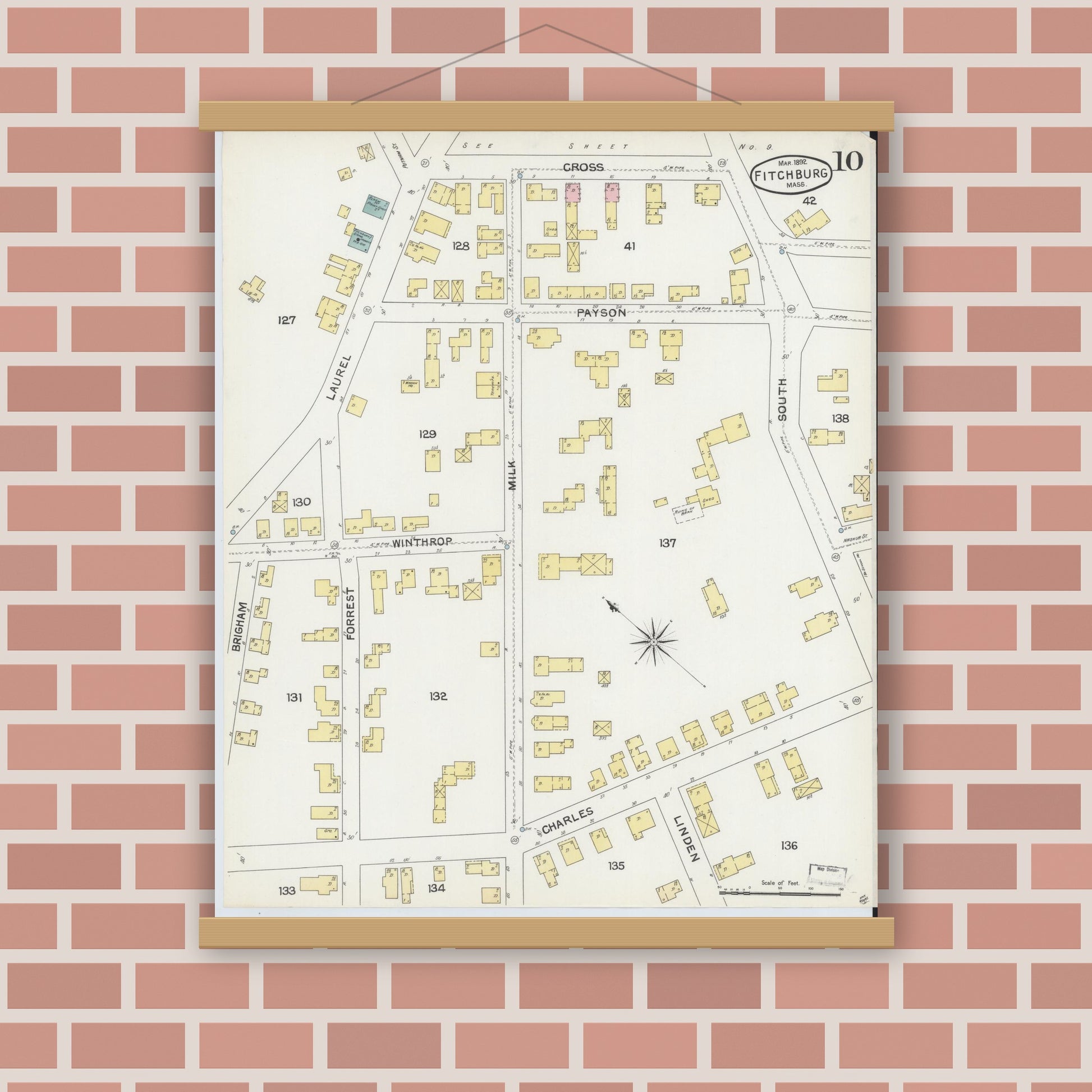 Old map wall art mockup — magnetic wood frame on brick wall — Sanborn Fire Insurance Map from Fitchburg, Worcester County, Massachusetts (1892), Sheet #0010