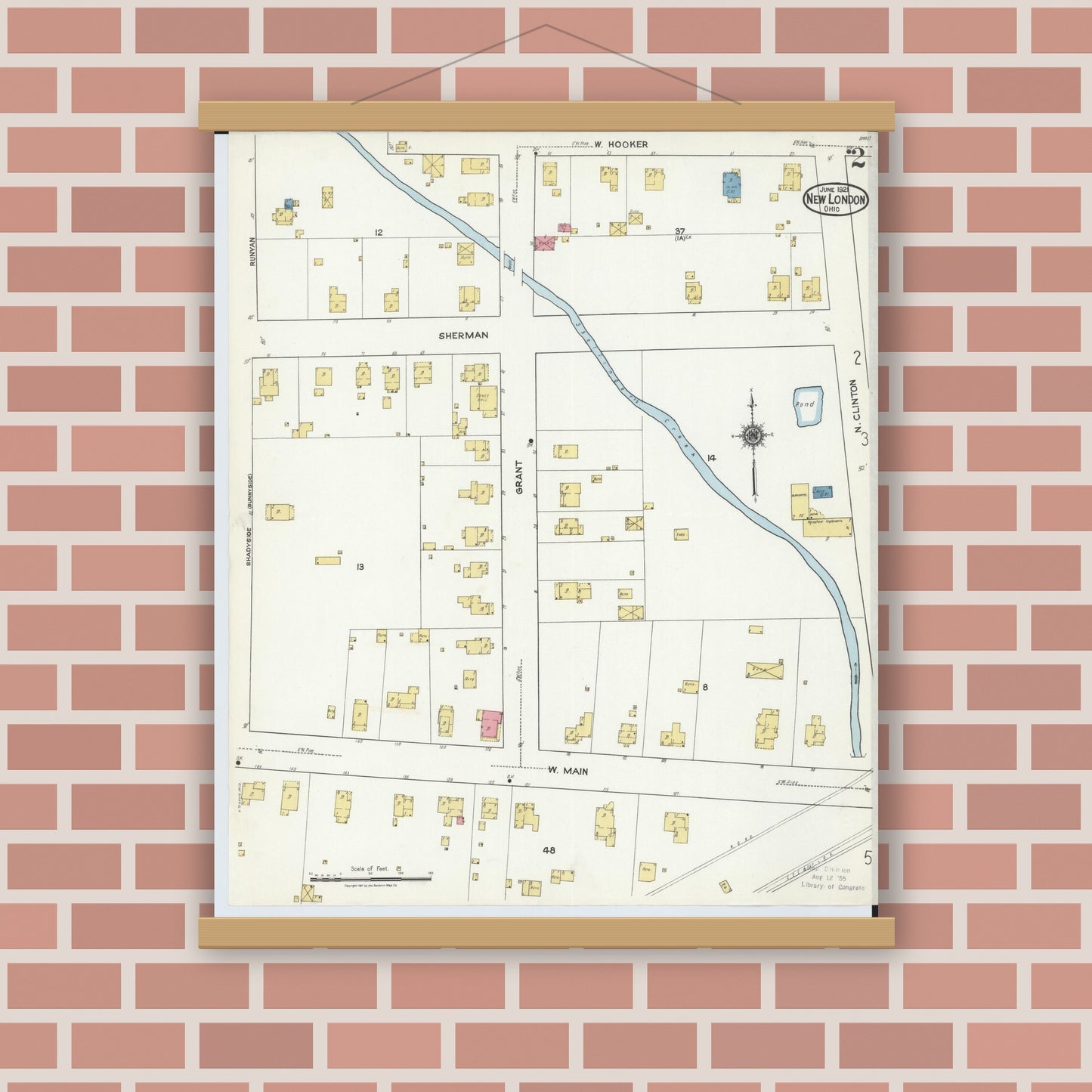 Old map wall art mockup — magnetic wood frame on brick wall — Sanborn Fire Insurance Map from New London, Huron County, Ohio (1921), Sheet #0002