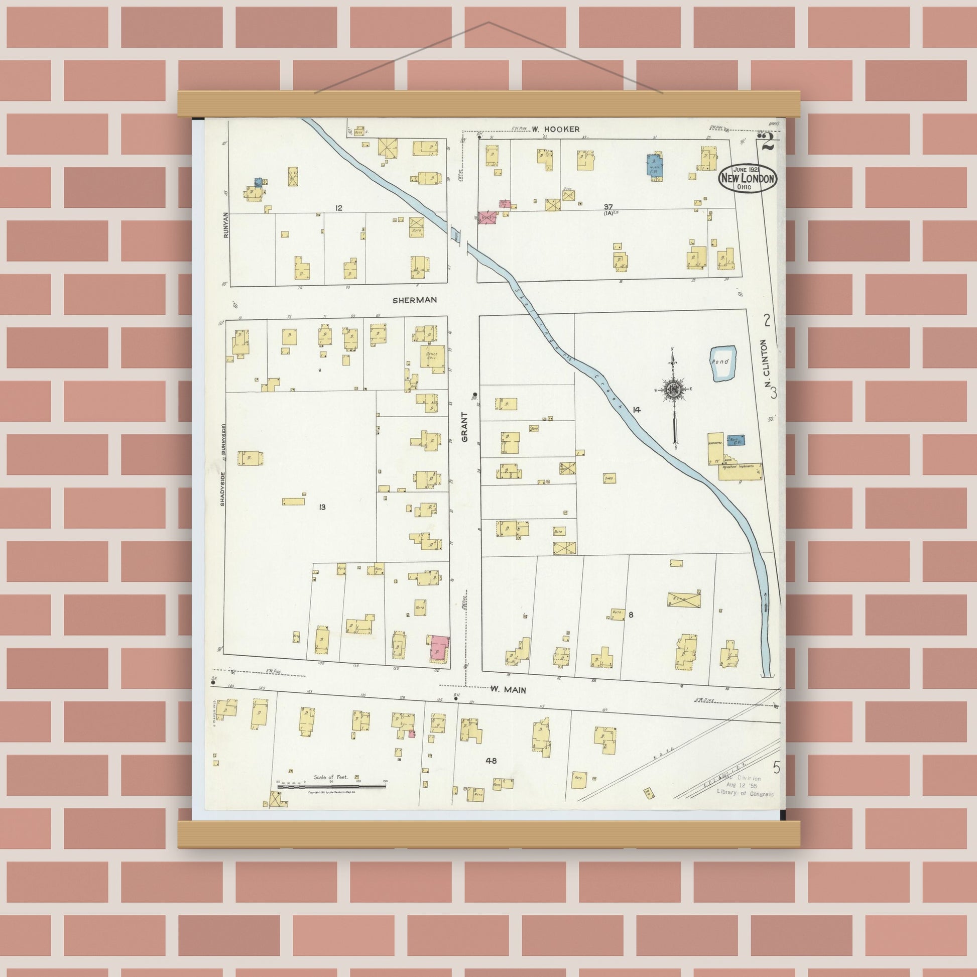Old map wall art mockup — magnetic wood frame on brick wall — Sanborn Fire Insurance Map from New London, Huron County, Ohio (1921), Sheet #0002