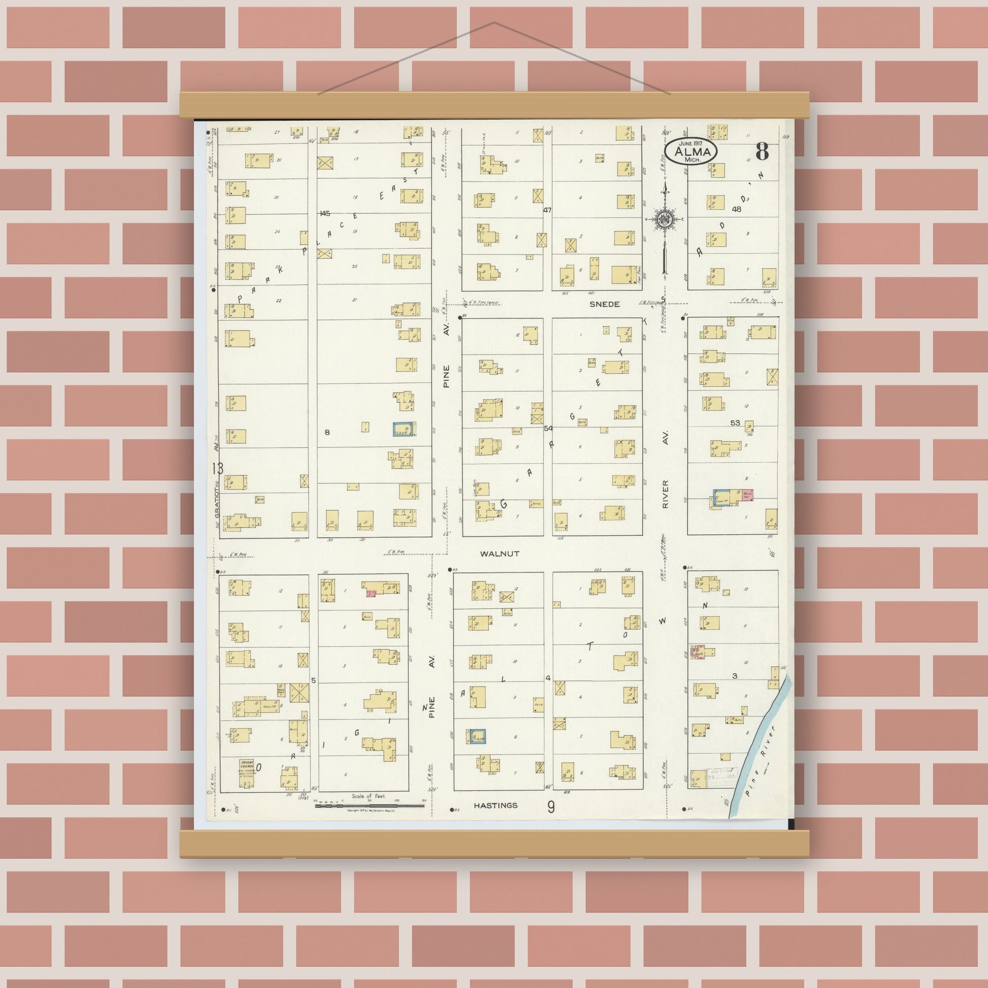 Old map wall art mockup — magnetic wood frame on brick wall — Sanborn Fire Insurance Map from Alma, Gratiot County, Michigan (1917), Sheet #0008