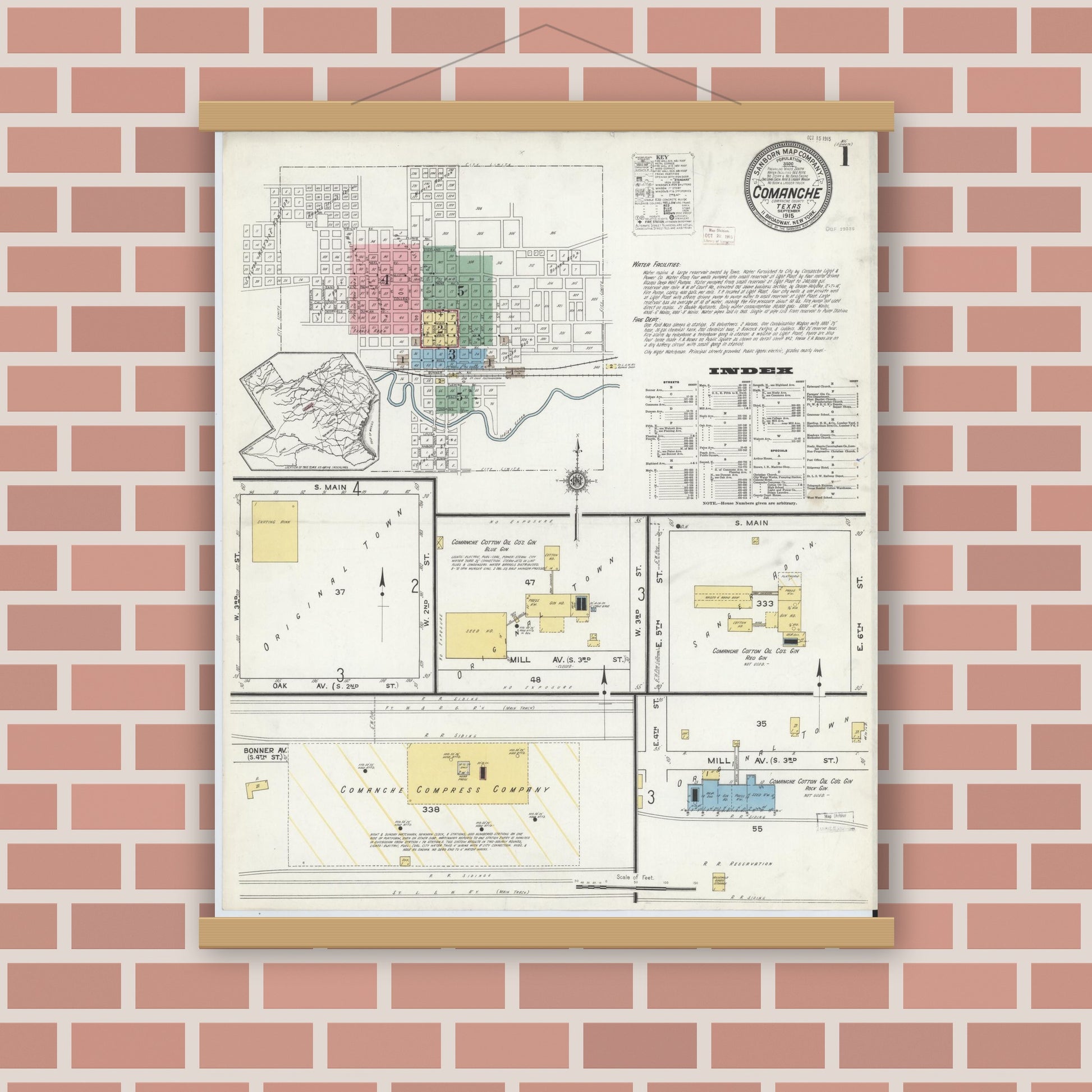 Old map wall art mockup — magnetic wood frame on brick wall — Sanborn Fire Insurance Map from Comanche, Comanche County, Texas (1915), Sheet #0001