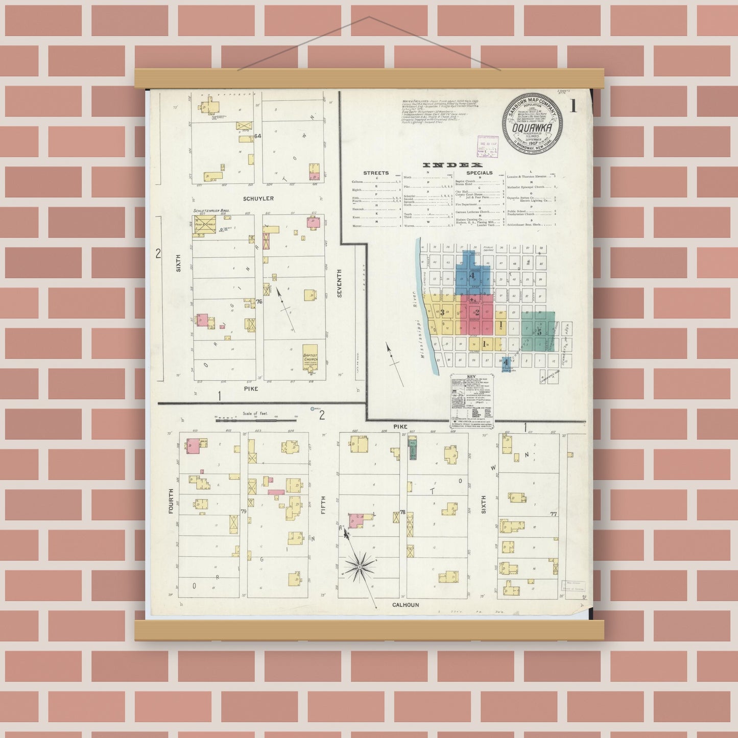 Old map wall art mockup — magnetic wood frame on brick wall — Sanborn Fire Insurance Map from Oquawka, Henderson County, Illinois (1907), Sheet #0001