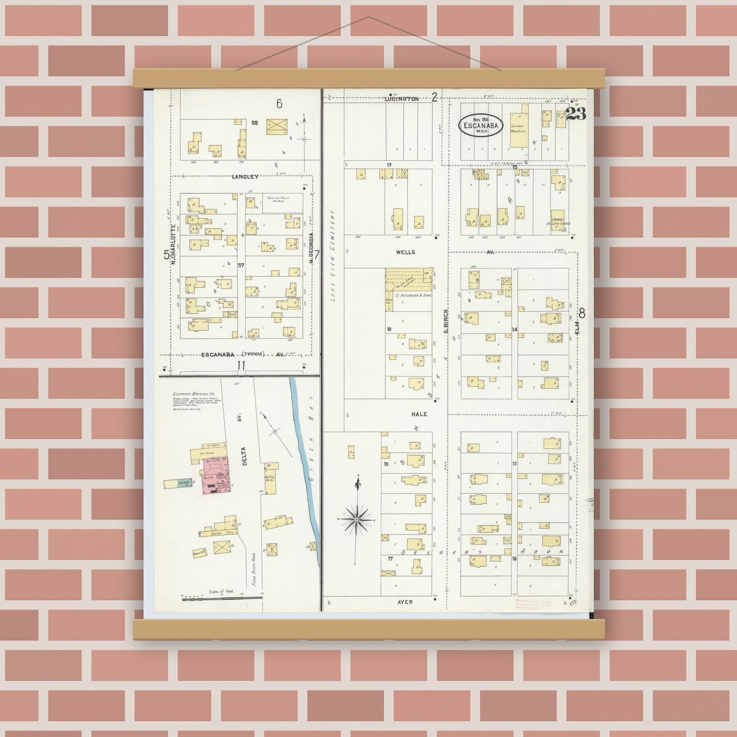 Old map wall art mockup — magnetic wood frame on brick wall — Sanborn Fire Insurance Map from Escanaba, Delta County, Michigan (1906), Sheet #0023