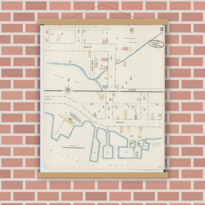 Old map wall art mockup — magnetic wood frame on brick wall — Sanborn Fire Insurance Map from Onekama, Manistee County, Michigan (1885), Sheet #0002