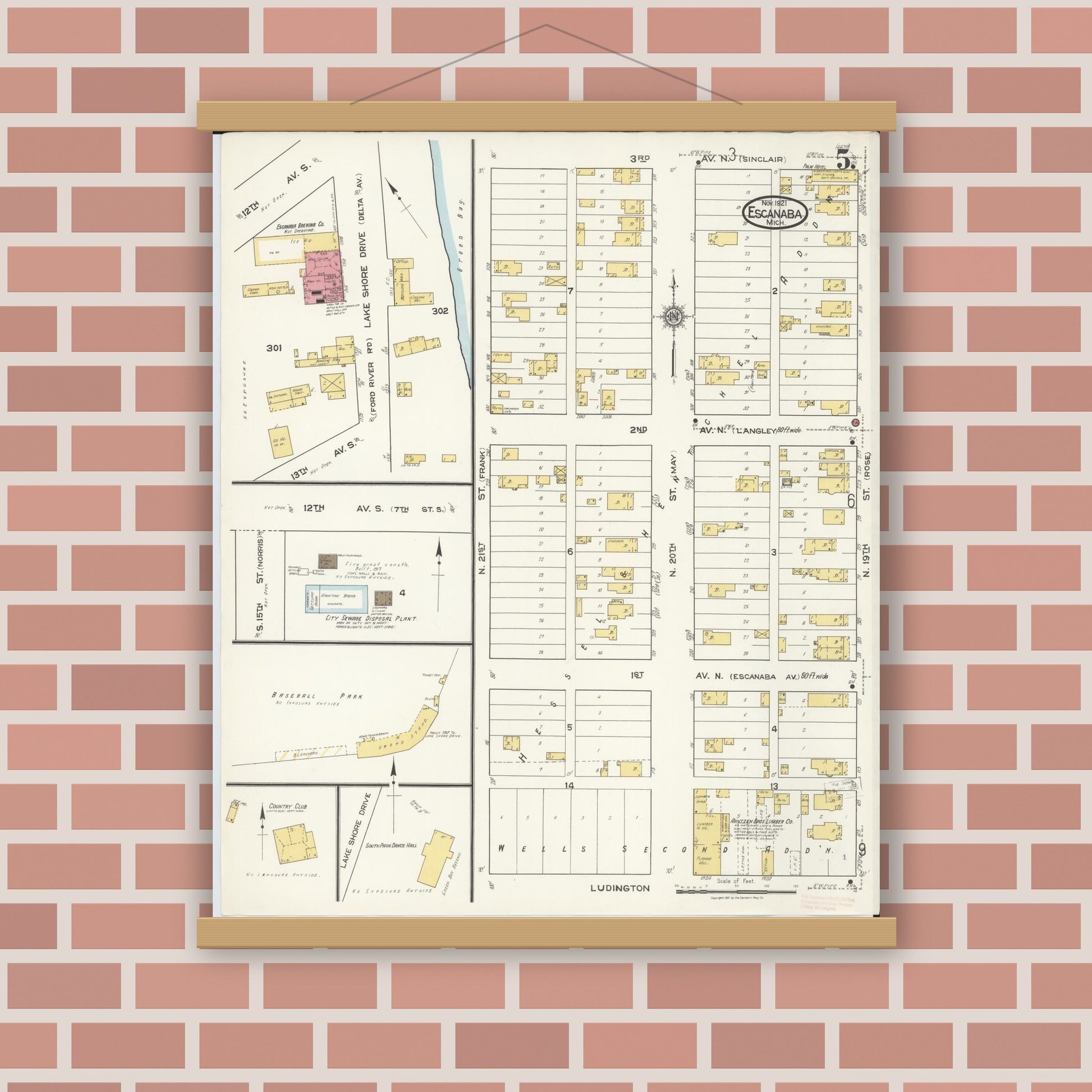 Old map wall art mockup — magnetic wood frame on brick wall — Sanborn Fire Insurance Map from Escanaba, Delta County, Michigan (1921), Sheet #0005