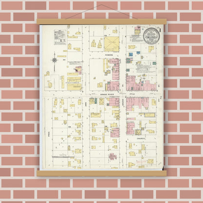 Old map wall art mockup — magnetic wood frame on brick wall — Sanborn Fire Insurance Map from Fowlerville, Livingston County, Michigan (1909), Sheet #0001