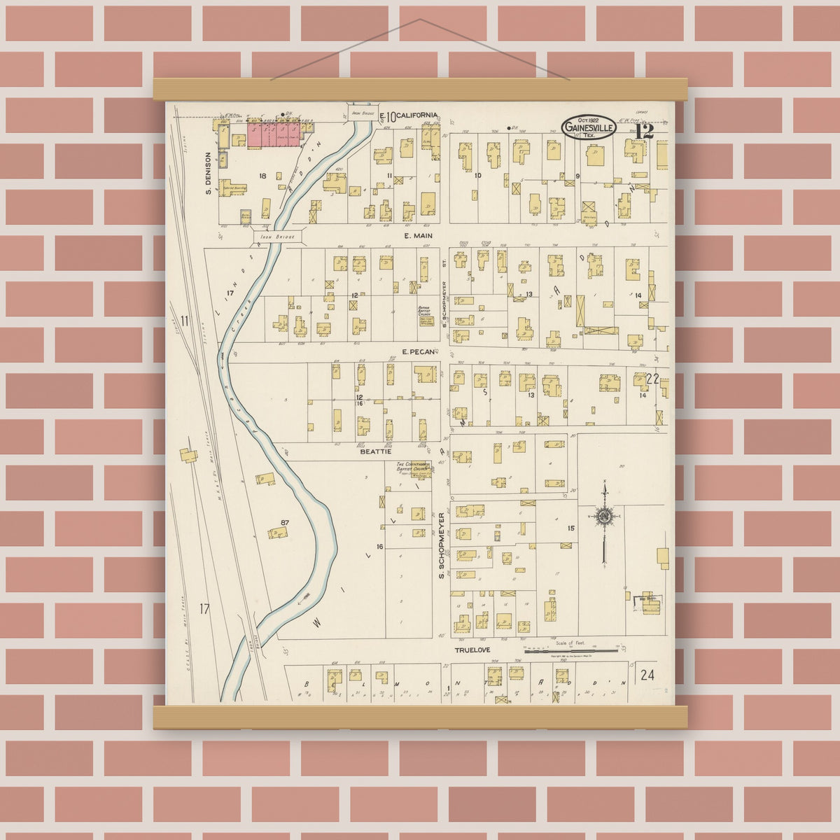 Old map wall art mockup — magnetic wood frame on brick wall — Sanborn Fire Insurance Map from Gainesville, Cooke County, Texas (1922), Sheet #0012