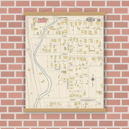 Old map wall art mockup — magnetic wood frame on brick wall — Sanborn Fire Insurance Map from Gainesville, Cooke County, Texas (1922), Sheet #0012