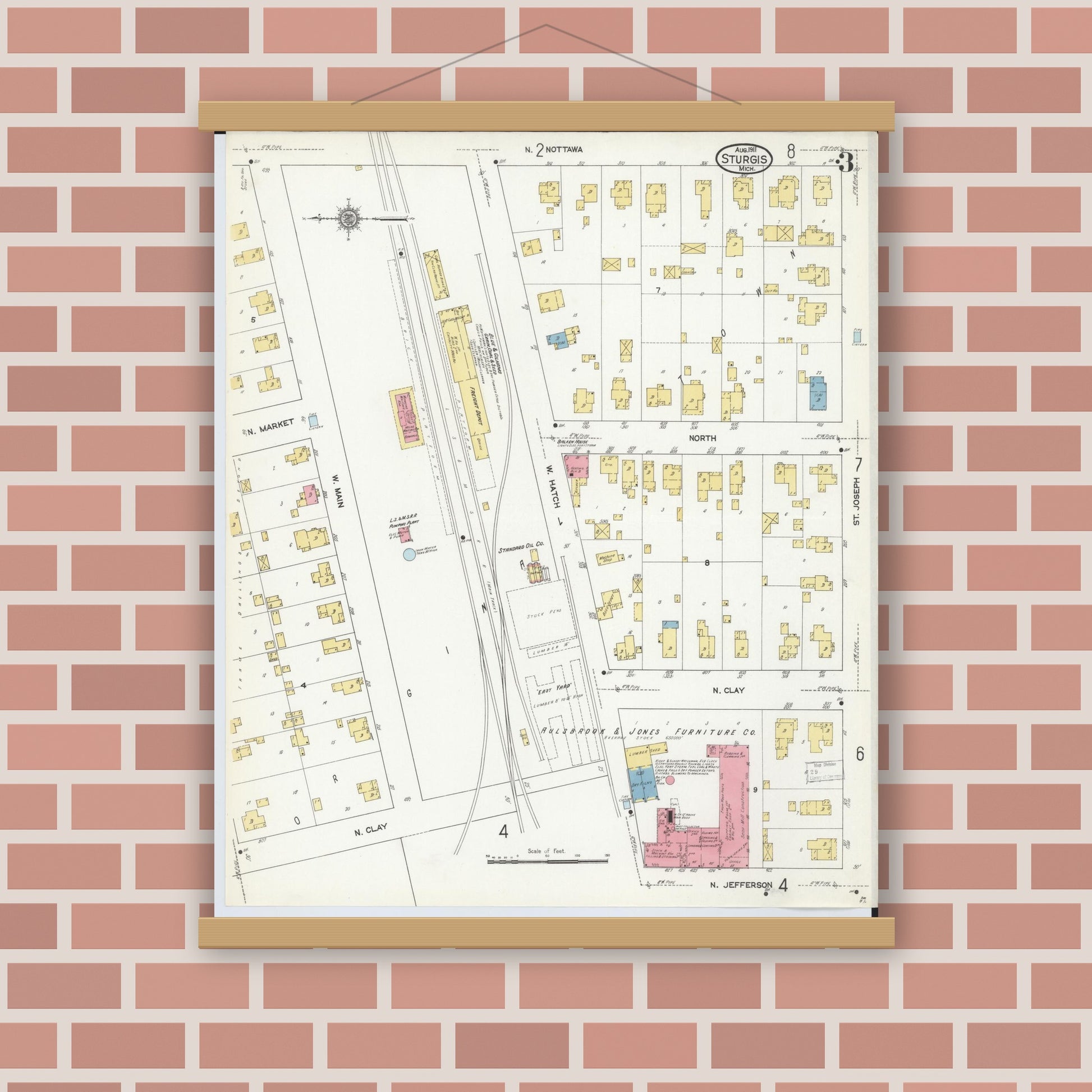Old map wall art mockup — magnetic wood frame on brick wall — Sanborn Fire Insurance Map from Sturgis, Saint Joseph County, Michigan (1911), Sheet #0003