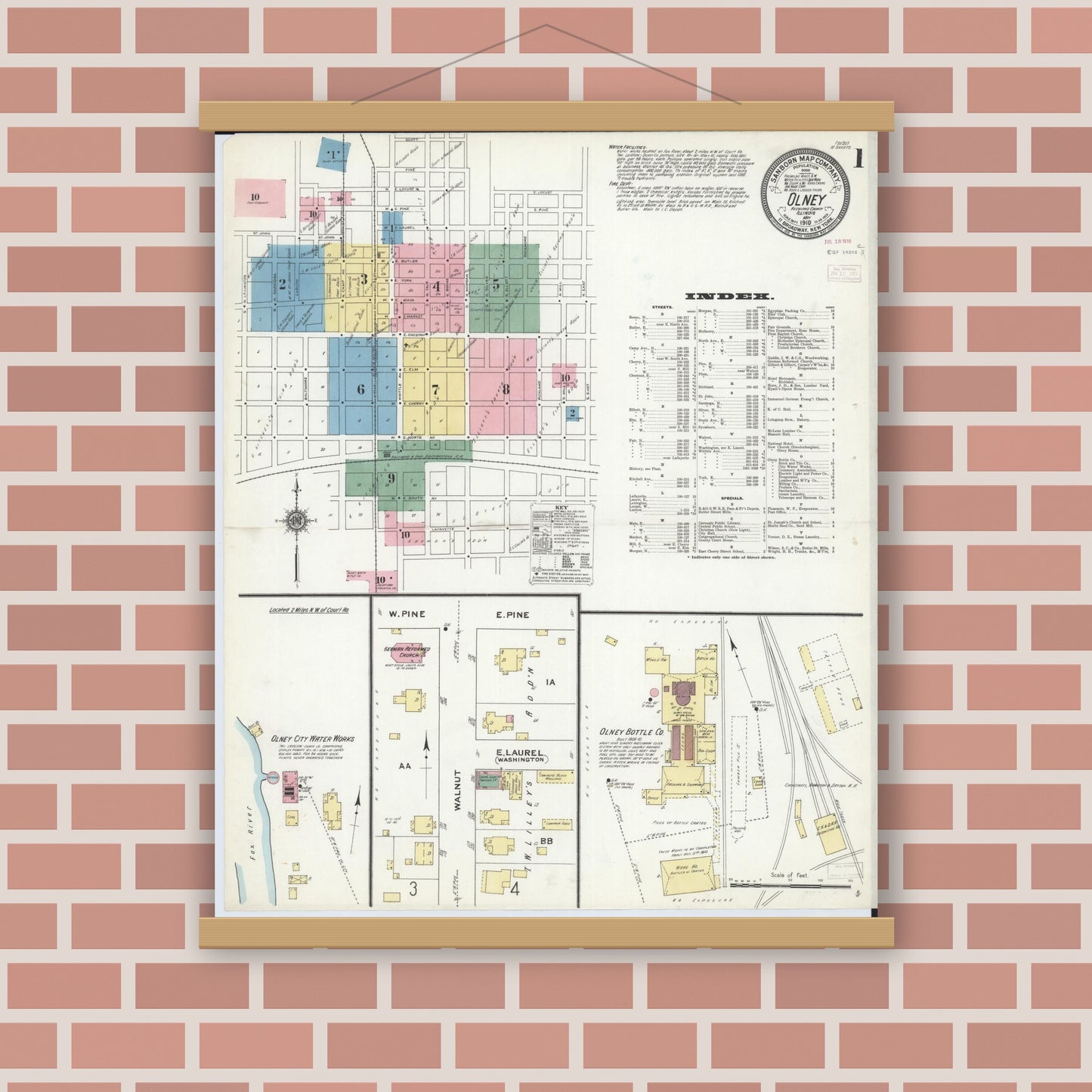 Old map wall art mockup — magnetic wood frame on brick wall — Sanborn Fire Insurance Map from Olney, Richland County, Illinois (1910) - Complete Map Set