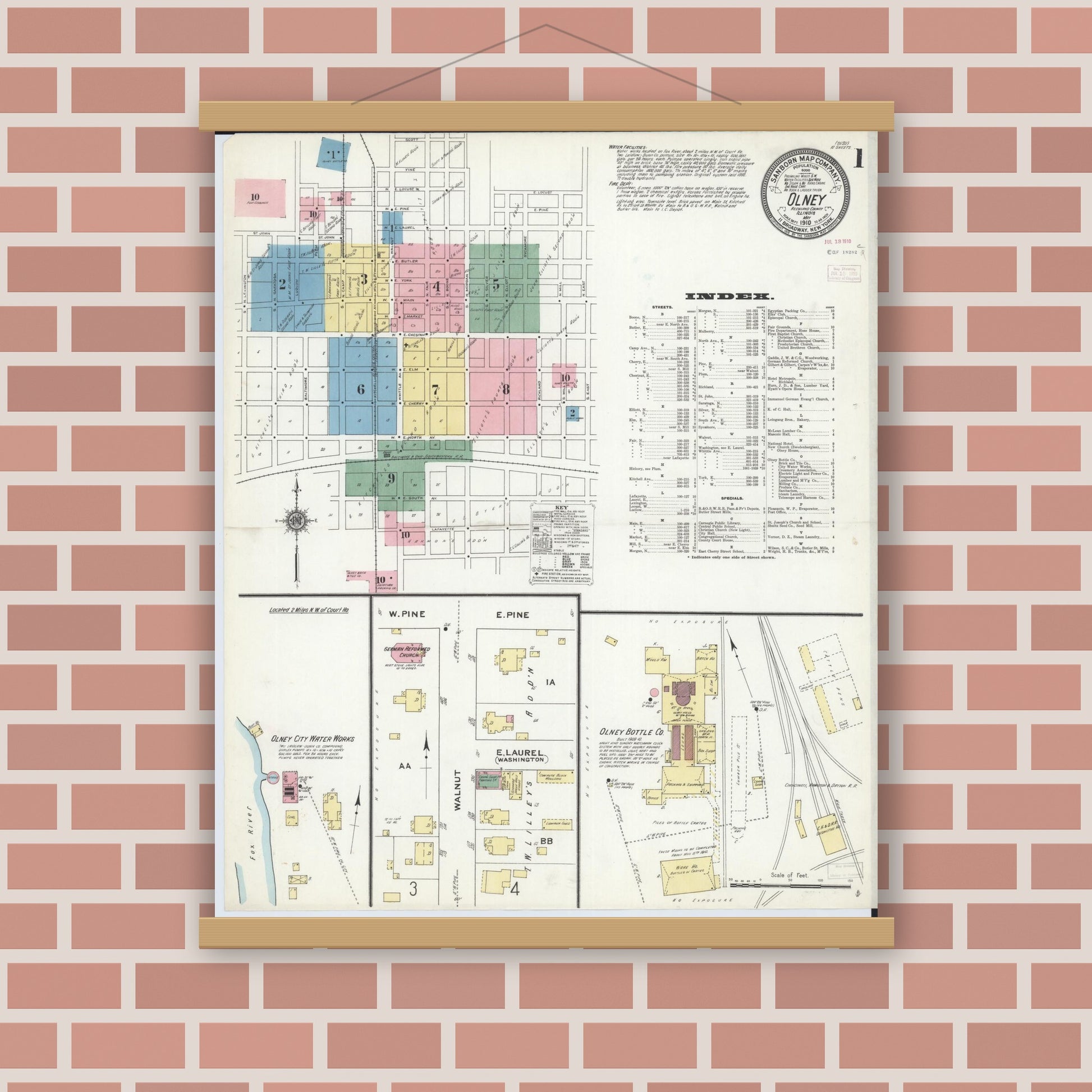 Old map wall art mockup — magnetic wood frame on brick wall — Sanborn Fire Insurance Map from Olney, Richland County, Illinois (1910) - Complete Map Set