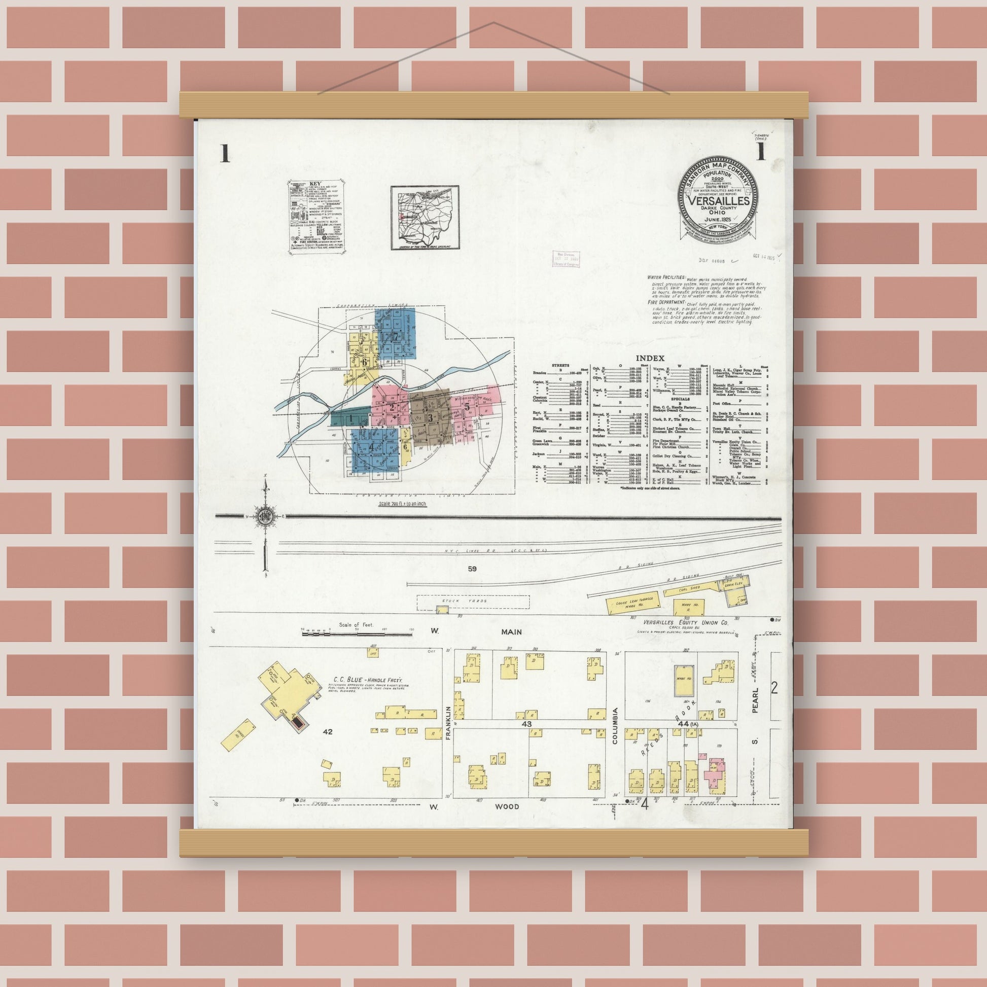 Old map wall art mockup — magnetic wood frame on brick wall — Sanborn Fire Insurance Map from Versailles, Darke County, Ohio (1925), Sheet #0001