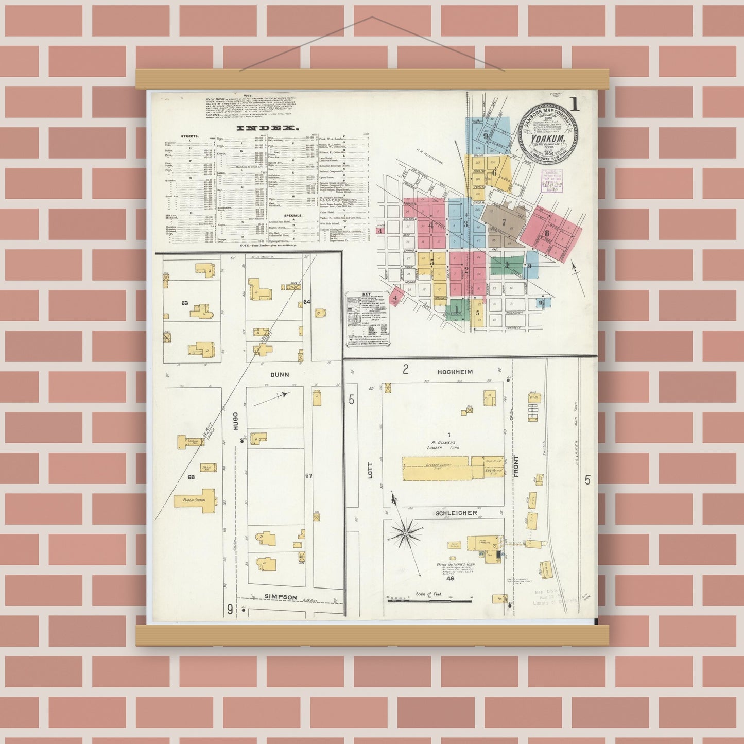 Old map wall art mockup — magnetic wood frame on brick wall — Sanborn Fire Insurance Map from Yoakum, De Witt And Lavaca Counties, Texas (1904) - Complete Map Set