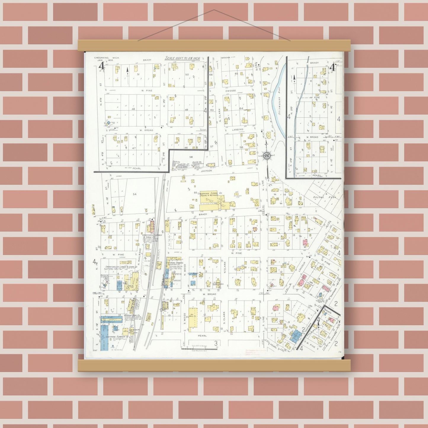 Old map wall art mockup — magnetic wood frame on brick wall — Sanborn Fire Insurance Map from Chesaning, Saginaw County, Michigan (1935), Sheet #0004