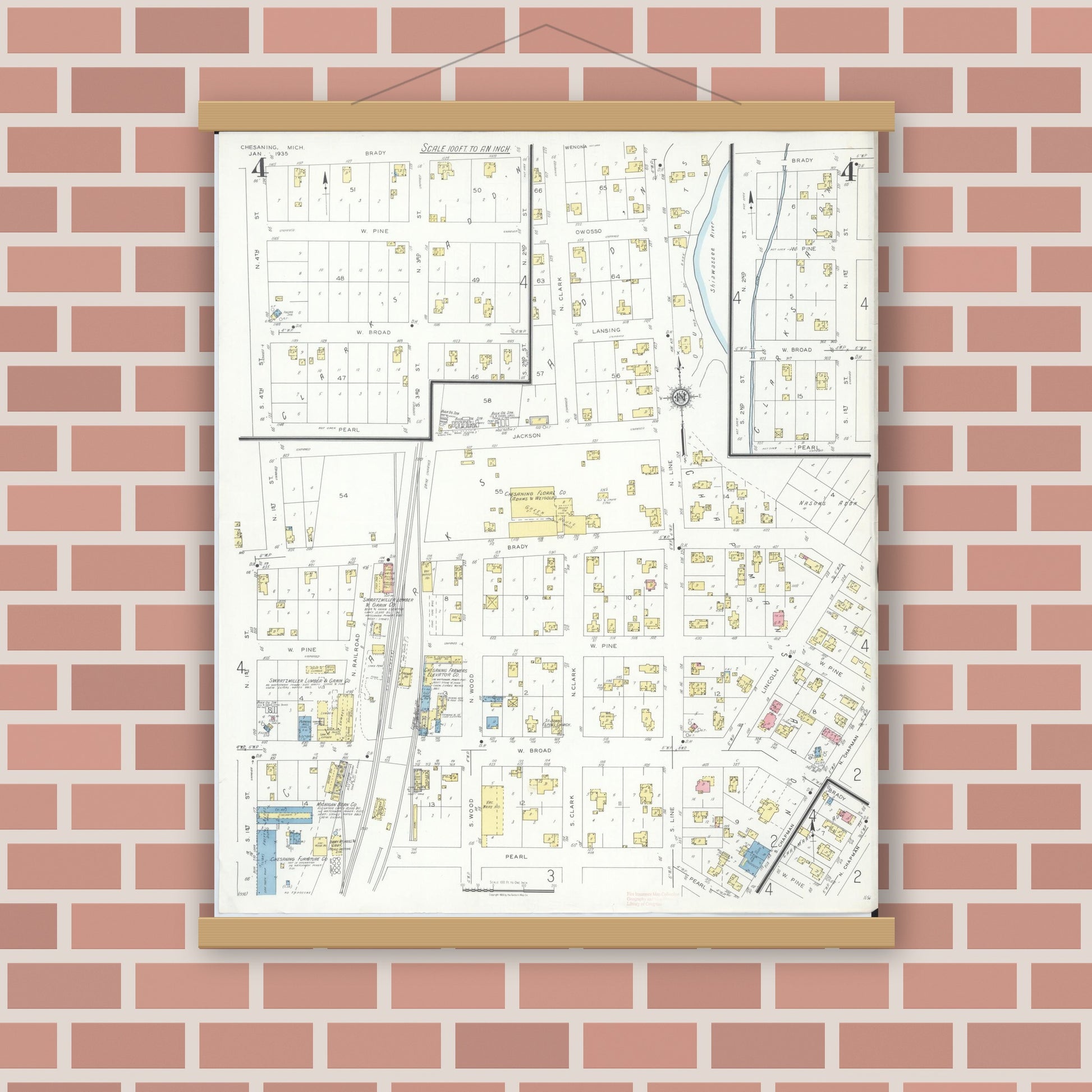 Old map wall art mockup — magnetic wood frame on brick wall — Sanborn Fire Insurance Map from Chesaning, Saginaw County, Michigan (1935), Sheet #0004