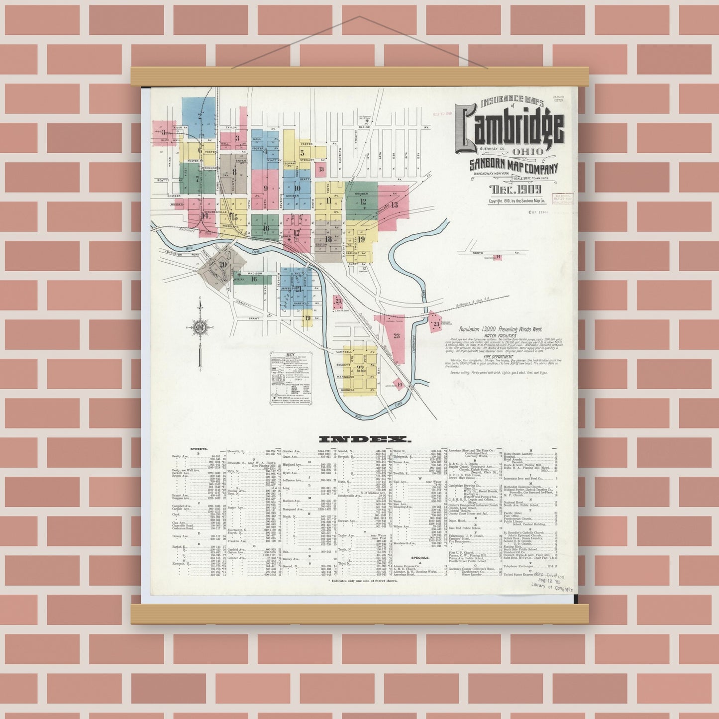 Old map wall art mockup — magnetic wood frame on brick wall — Sanborn Fire Insurance Map from Cambridge, Guernsey County, Ohio (1909), Sheet #0001