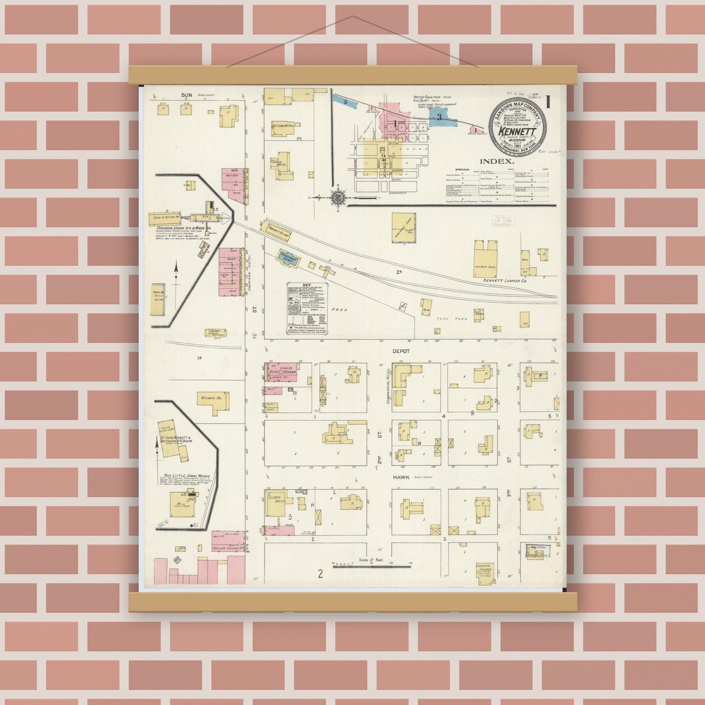 Old map wall art mockup — magnetic wood frame on brick wall — Sanborn Fire Insurance Map from Kennett, Dunklin County, Missouri (1911), Sheet #0001