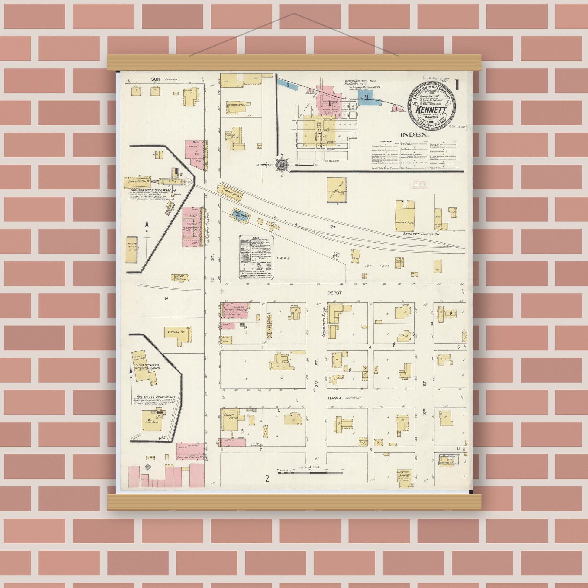 Old map wall art mockup — magnetic wood frame on brick wall — Sanborn Fire Insurance Map from Kennett, Dunklin County, Missouri (1911), Sheet #0001