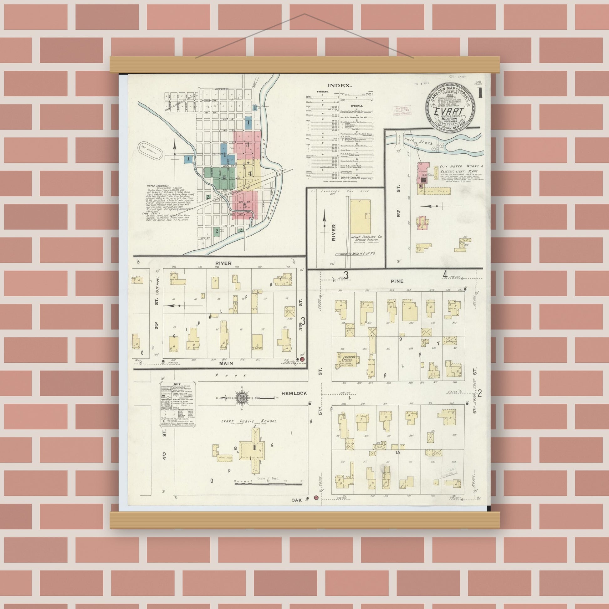 Old map wall art mockup — magnetic wood frame on brick wall — Sanborn Fire Insurance Map from Evart, Osceola County, Michigan (1910), Sheet #0001