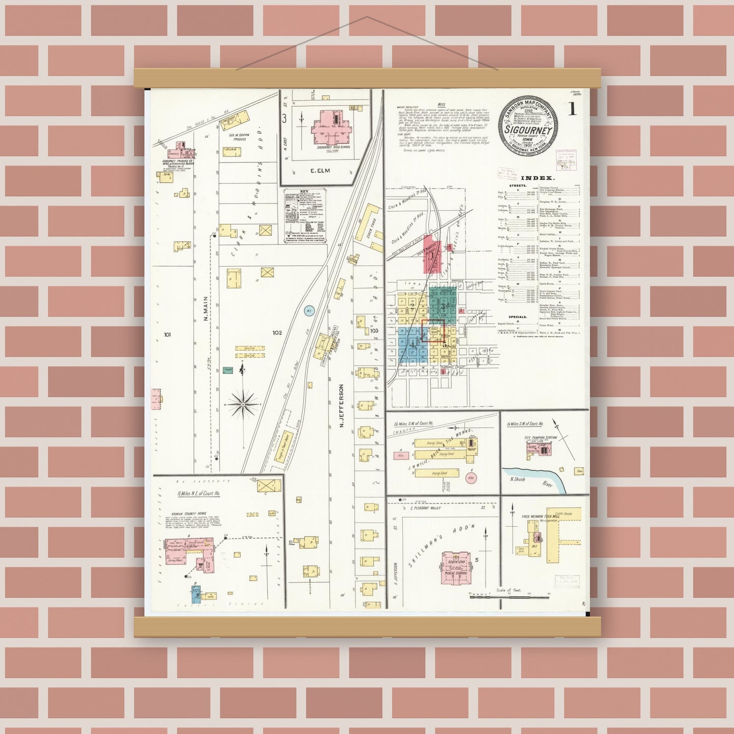 Old map wall art mockup — magnetic wood frame on brick wall — Sanborn Fire Insurance Map from Sigourney, Kiokuk County, Iowa (1906) â€” Complete Set