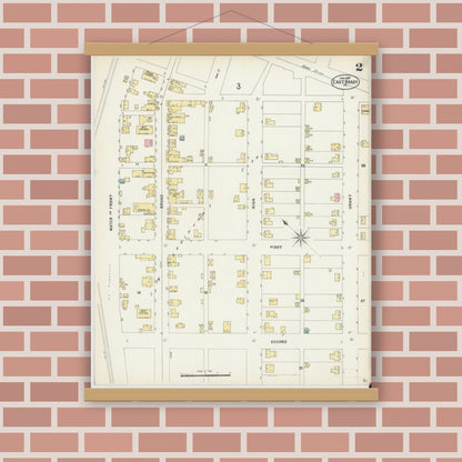 Old map wall art mockup — magnetic wood frame on brick wall — Sanborn Fire Insurance Map from East Brady, Clarion County, Pennsylvania (1897), Sheet #0002