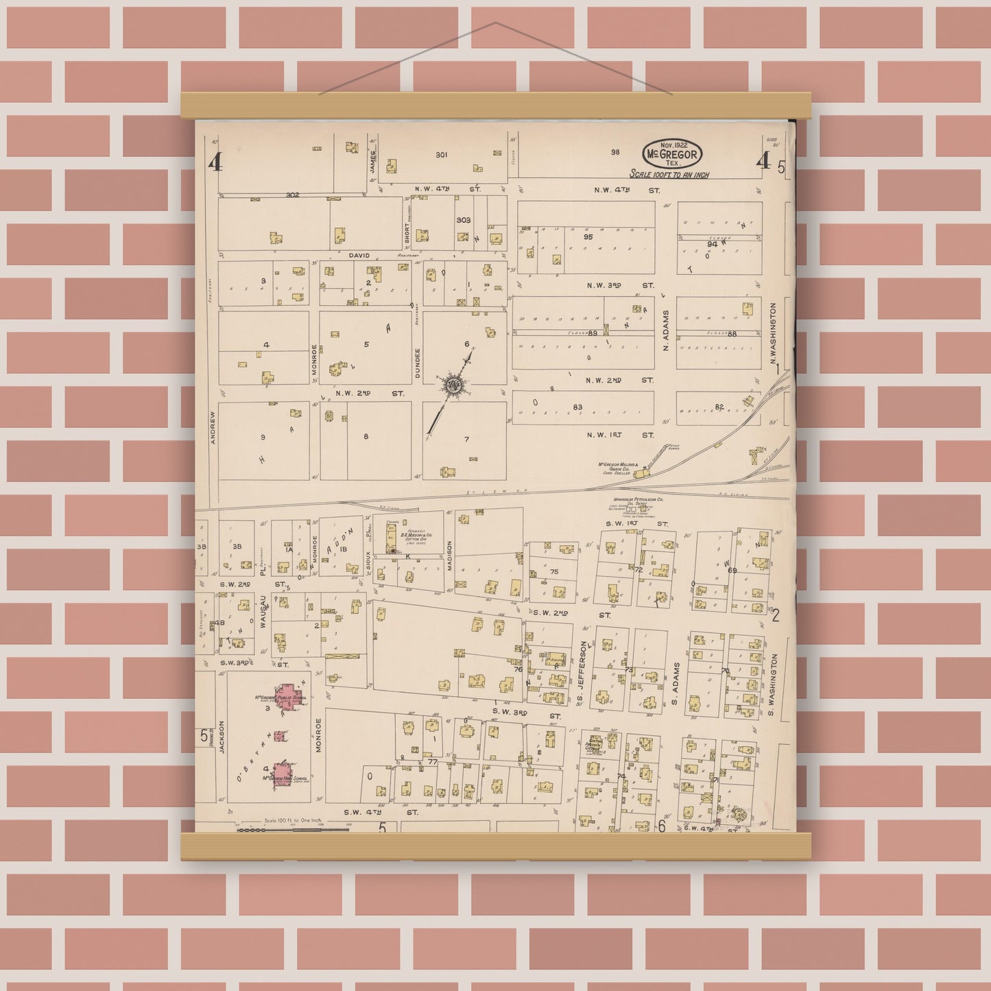 Old map wall art mockup — magnetic wood frame on brick wall — Sanborn Fire Insurance Map from McGregor, McLennan County, Texas (1922), Sheet #0004